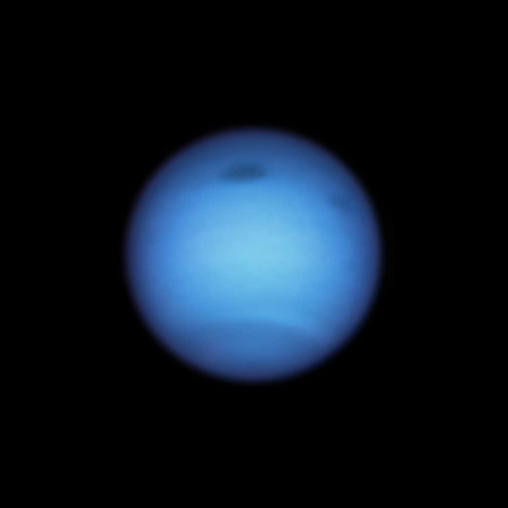 NASAさんのインスタグラム写真 - (NASAInstagram)「Storms, they are a-brewin'🌪  Astronomers using the @NASAHubble Space Telescope watched a wild and mysterious dark vortex on Neptune abruptly steer away from a likely death on the giant blue-green planet. The storm, which is wider than the Atlantic Ocean (that’s approximately 4,600 miles across), was first discovered in the planet’s northern hemisphere by Hubble in 2018. To the surprise of astronomers, Hubble spotted the vortex change direction in August 2020, doubling back to the north. Though Hubble has tracked similar dark spots over the past 30 years, this unpredictable atmospheric behavior is something new to see!  Astronomers are excited about the findings because it is potentially part of the dark spot’s disruption process, which has never been observed. Dark spots often faded away and then disappeared, but  astronomers have never seen a storm on another planet make a sudden U-turn and drift back northward.  Credits: NASA, ESA, STScI, M.H. Wong (University of California, Berkeley), and L.A. Sromovsky and P.M. Fry (University of Wisconsin-Madison)  #Neptune #NASA #Hubble #HubbleTelescope  #StormWatch #Space #Science #Universe」12月17日 0時48分 - nasa