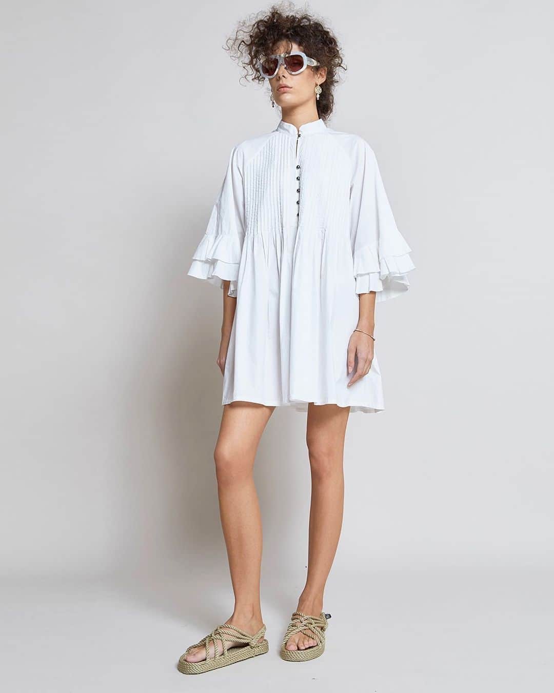 カレンウォーカーのインスタグラム：「A favourite from our 2017 collection ‘Babou’s Revenge’, the Pintuck Dress is back again in GOTS certified organic cotton, produced by our @fairtradecertified makers in Chennai, India. On karenwalker.com (or link in profile) now and in-stores tomorrow with a shirt version coming in 2 days.」