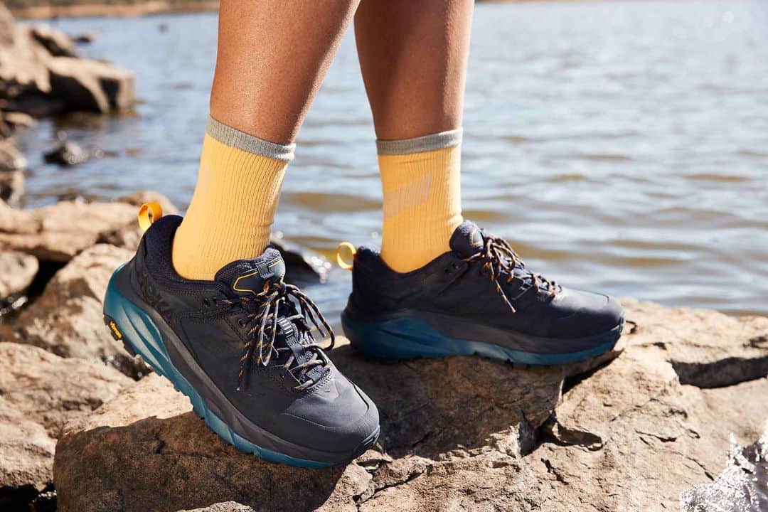 ホカオネオネのインスタグラム：「Get low in the Kaha Low GTX. This ankle-height hiking shoe provides peak cushioning for easier uphill climbs and smoother downhill descents.   Remarkably lightweight and cushioned, the Kaha Low GTX offers the full HOKA package – unique HOKA foam technology, Vibram® Megagrip traction for extra stability and an adjustable lacing system for a customized feel every step.  Soft and smooth, yet inherently supportive, the new Kaha Low GTX offers the same GORE-TEX bootie as the original to keep you comfortable and dry in every condition. Hike on, the trail awaits.  Hit the trails with the Kaha Low GTX. Reserve your pair before 1/1 at the link in our bio today. #TimeToFly」