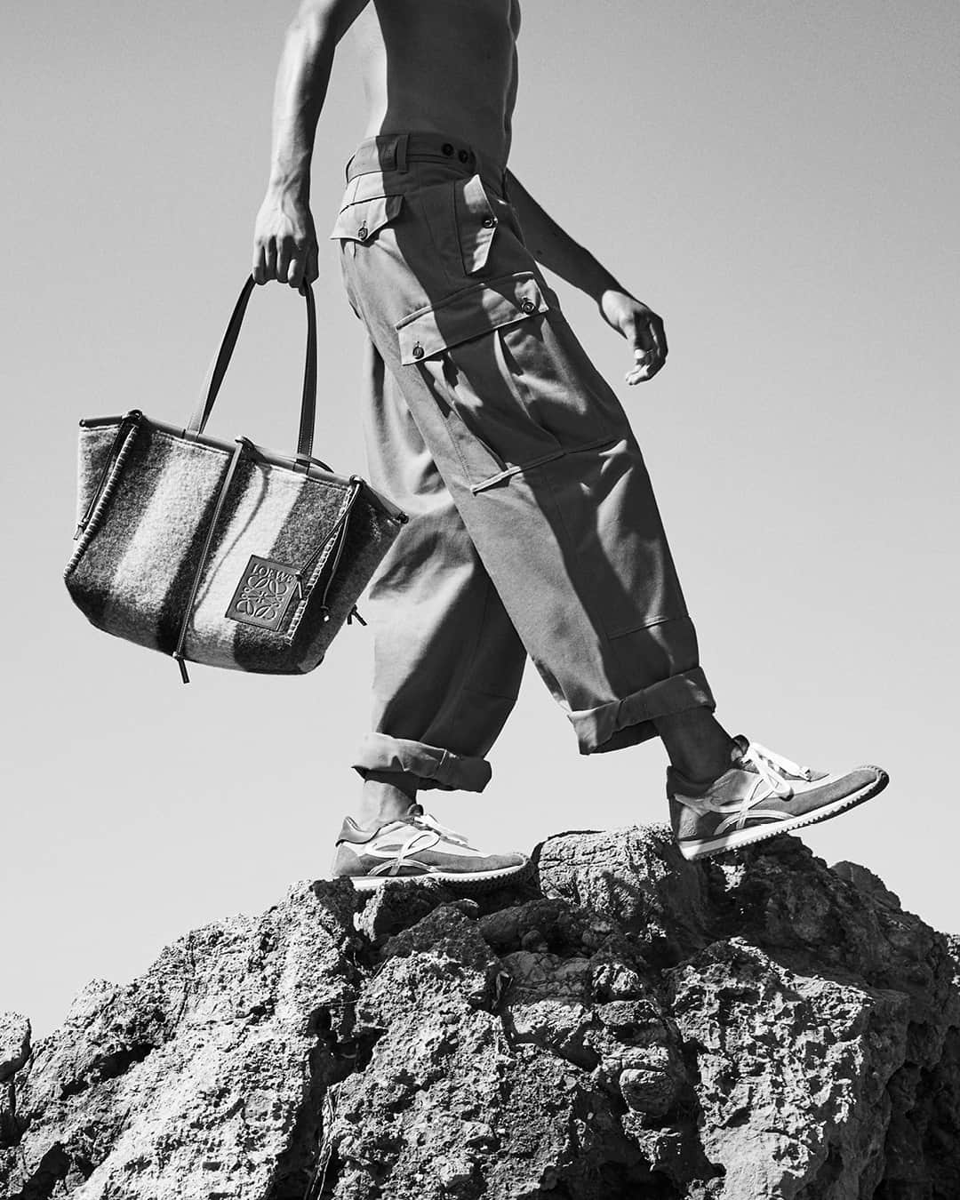 のインスタグラム：「Exploring the rocky landscape of Majorca's coastline in LOEWE Spring Summer 2021 knitwear. Photography by Gray Sorrenti   loewe.com  #LOEWE #LOEWESS21」