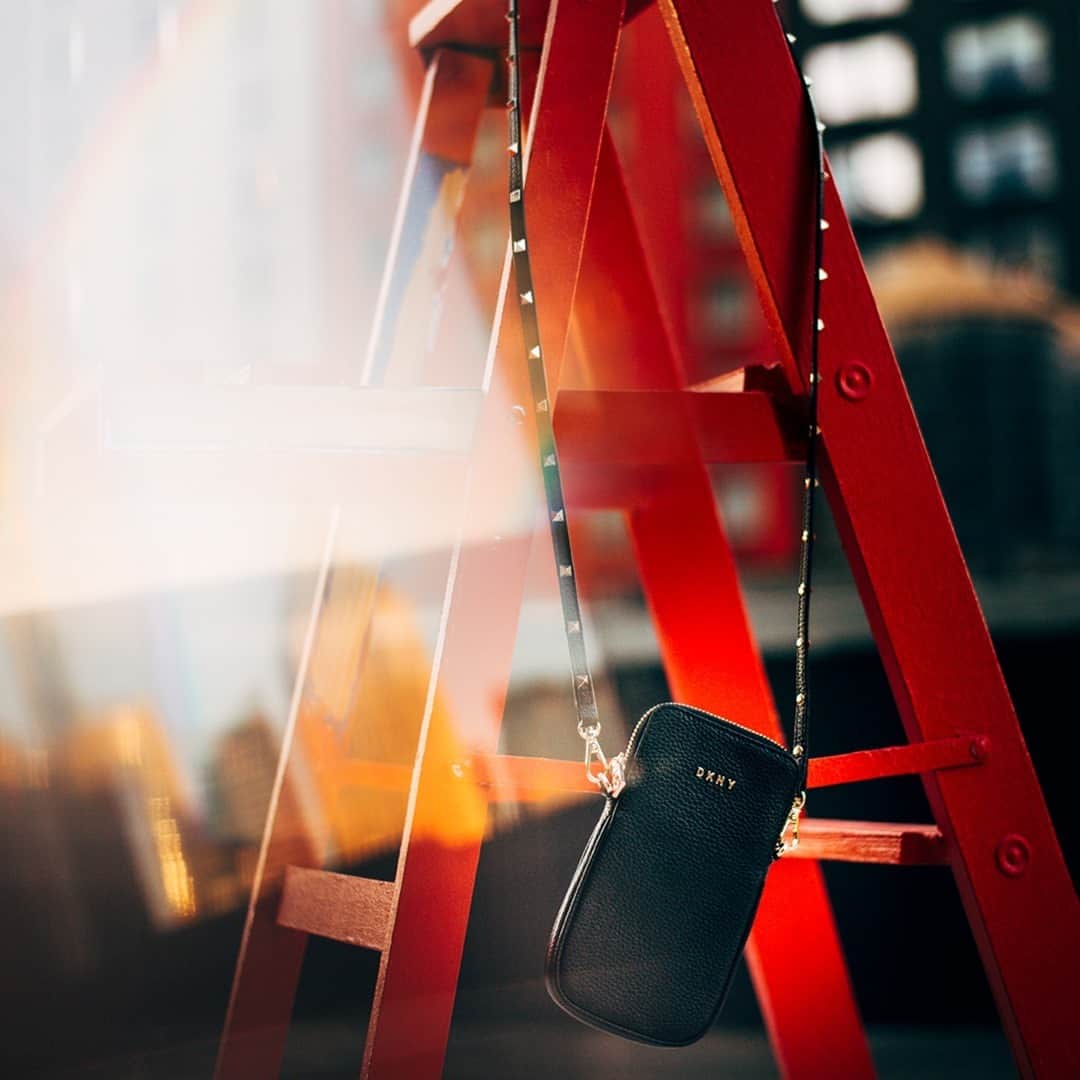 DKNYのインスタグラム：「A star-studded presence: tap to shop the Stud Phone Crossbody. #DKNYSTATEOFMIND」