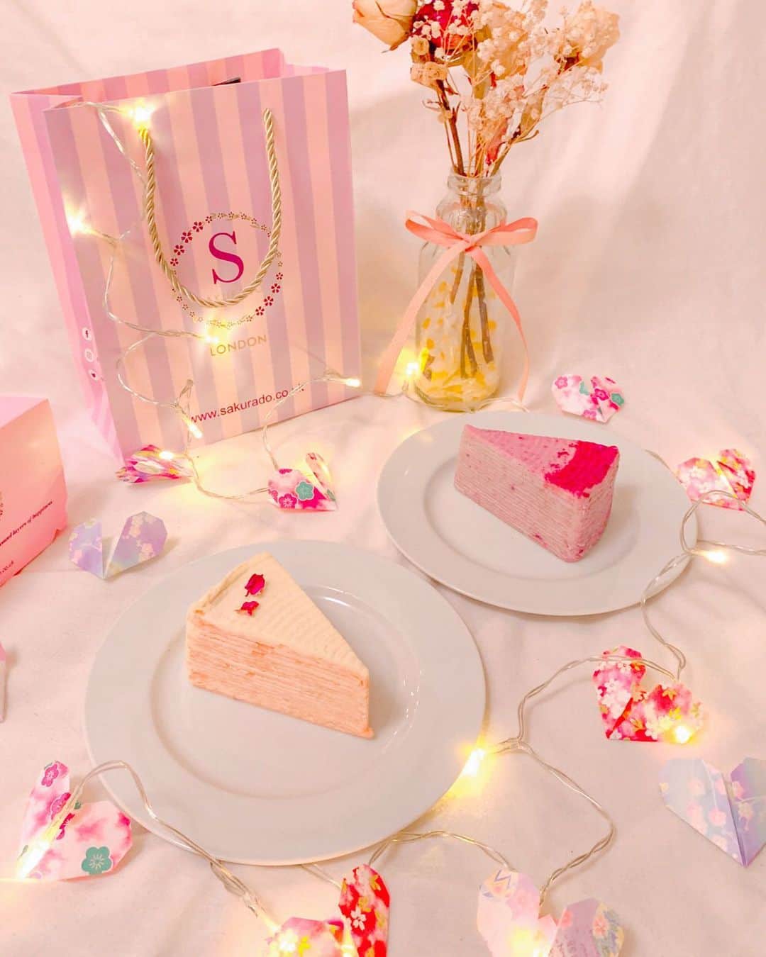 Eat With Steph & Coさんのインスタグラム写真 - (Eat With Steph & CoInstagram)「🌸 Rose & Sweet Potato Mille Crepe Cakes 🍰 @sakuradolondon ✨⠀ We had a hard time choosing at the counter as they had such a wonderful selection of flavours. The rose mille crepe we tried was more floral and delicate whilst the sweet potato slice was richer in taste, but both were so delightfully creamy and delicious! 💖⠀ Plus they also have matcha, hojicha, yuzu, mango, lychee, sesame and even durian I hear... 😉💕 So make sure to save these for a sweet afternoon when you next pass by @chinatownlondon! #invite⠀ ⠀ 📸 @rain.sprout⠀ ⠀ 📍 Location: Soho⠀ 💰 Price: £6.25 per slice⠀ 👨‍🍳 Cuisine: Japanese⠀ ❤️ Best for: Desserts⠀ ☎️ Book ahead: Takeaway only⠀ 🌱 Veg options: Contain eggs & milk⠀ 🍽 Top dishes: Mille crepe cakes⠀ ⠀ ⠀ ⠀ #foodstagram #eeeeeats #forkyeah #londonfood #timeoutlondon #eatlondon #infatuationlondon #foodenvy #eatinglondon #foodinlondon⠀ #millecrepe #millecrepes #dessert #dessertlovers #londondessert #sweetpotatocake #purplesweetpotato #millecrepecake #sweettoothcravings #crepecake #dessertshop #beautifuldesserts #patisserie #soholondon #cakesofinstagram #rosecake #pinkcakes #cakelover」12月18日 17時08分 - eatwithsteph_ldn