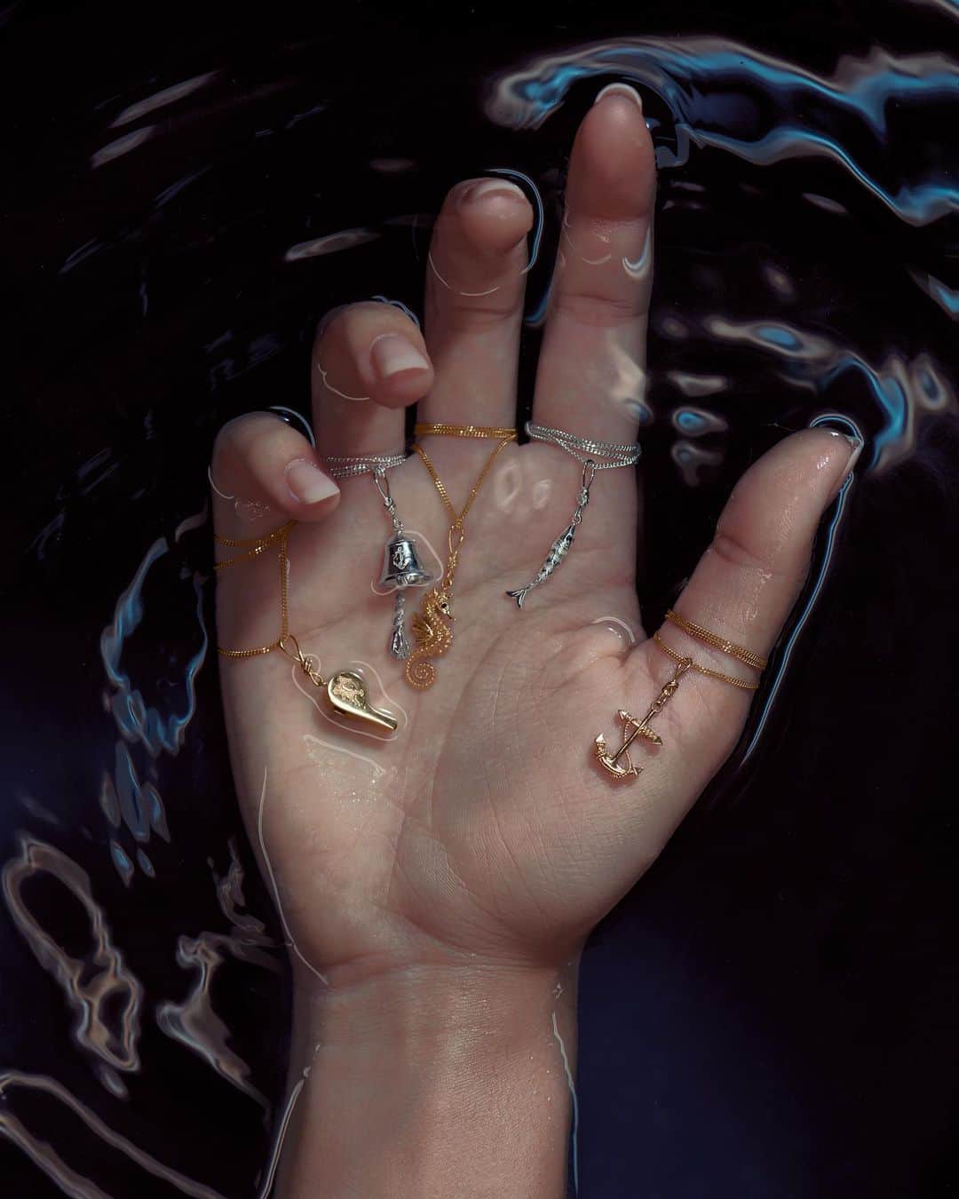 カレンウォーカーのインスタグラム：「The Navigator // Sea creatures, a KW ship’s bell and anchor and a fully functioning Runaway Girl whistle (see previous post) as fine jewellery cast in 9 carat gold, rose gold or sterling silver.」
