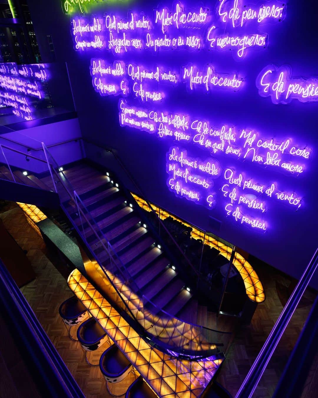 THE RIGOLETTOのインスタグラム：「〈RIGOLETTO〉 2階へ上がる階段にある紫のネオンは、 オペラ「リゴレット」の歌詞。  巨大なワインセラーと、その横にあるこのネオンの壁は 渋谷Rigolettoきってのフォトジェニックスペースです。  ≪ALL NATURAL≫﻿ NO MSG and ZERO TRANS FAT,ORGANIC SUGAR,NATURAL SALT﻿ ​ ​ THE RIGOLETTO（渋谷） [Access] 東京都渋谷区渋谷1-23-21 渋谷キャストGF/1F ​ [Hours] 月～木 11:30-24:00 金・土 11:30-26:00 日 11:30-23:00 ​ [Tel] 03-6631-1129 ​ [Web] http://www.rigoletto.jp/shibuya/ ​ ▼ご予約はプロフィールページ @rigoletto_shibuya のリンクより ​ ​ #huge_restaurant #huge_rigoletto #therigoletto #rigoletto #italian #spanish #spanishitalian #italianfood #shibuya #winecellar #shibuyarestaurant #bar #shibuyabar #リゴレット #スパニッシュイタリアン #イタリアン #スパニッシュ #渋谷イタリアン #渋谷レストラン #渋谷グルメ #渋谷ランチ #渋谷ディナー #渋谷バー #深夜営業」