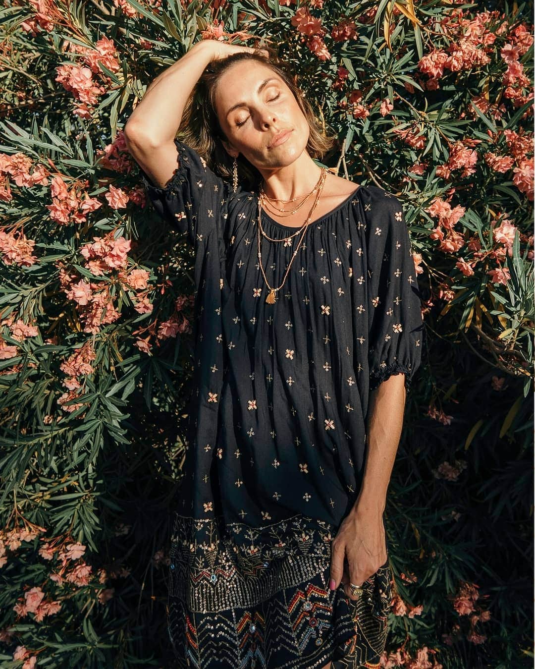 ミーガンパークのインスタグラム：「A collectable, artisanal heirloom! The new Izra Embellished Dress is a true work of hand embroidered and beaded art. Combining tarnished golden sequins, hand cut miniature mirrors, wood and glass beads, combined with silken threads, the stunning piece is inspired by traditional Gujarati embroidery. Worn here by the beautiful Anna @gypsyfind」