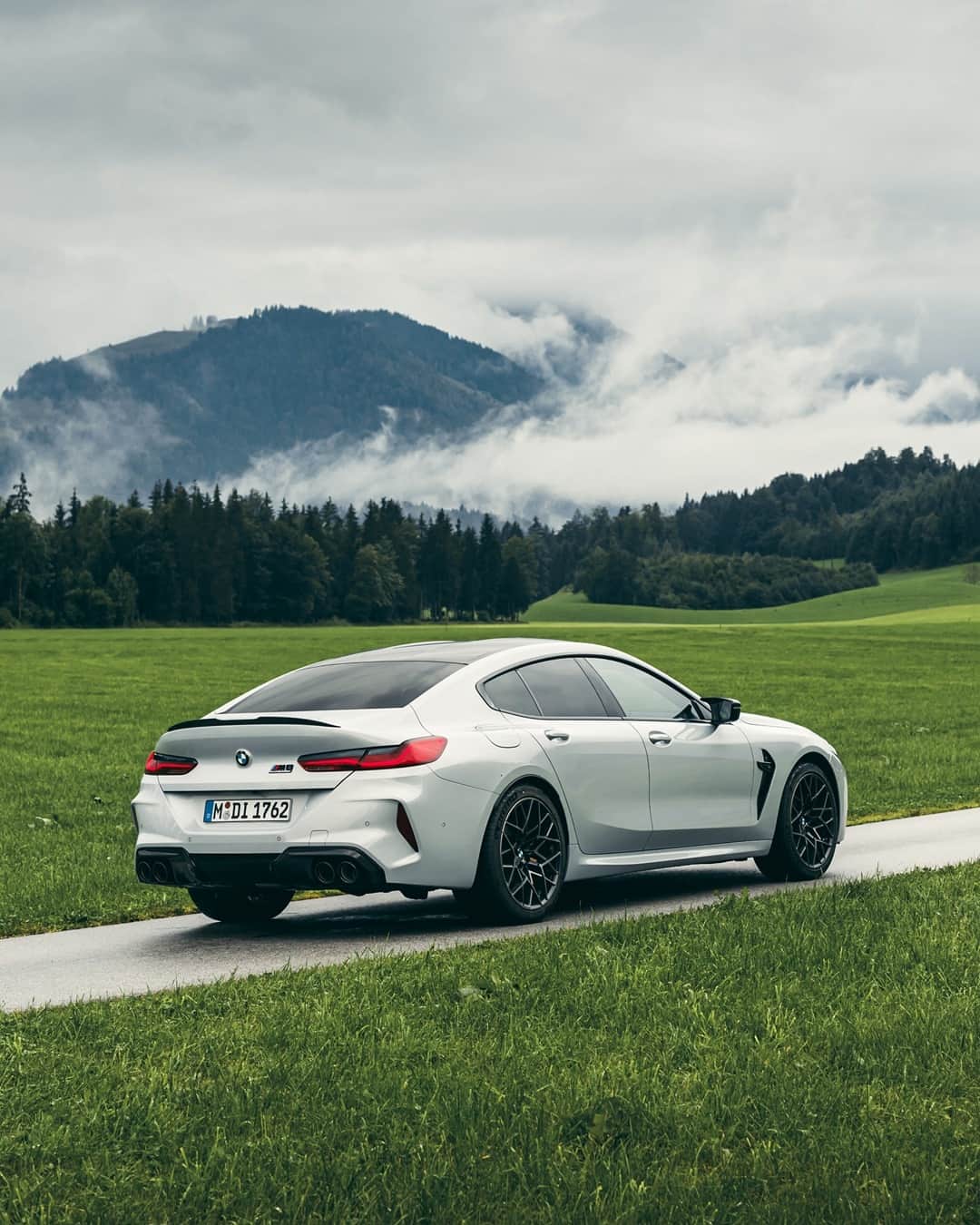 BMWのインスタグラム：「Off to catch the clouds.  The BMW M8 Competition Gran Coupé. #TheM8 #BMW #M8 #BMWM @bmwm @kenozache __ BMW M8 Competition Gran Coupé: Fuel consumption in l/100 km (combined): 10.7–10.5. CO2 emissions in g/km (combined): 244–240.* Further information: www.bmw.com/disclaimer.  Acceleration (0-100 km/h): 3.2 s. Power: 460 kW, 625 hp, 750 Nm. Top speed (limited): 250 km/h (with optional M Drivers Package: 305 km/h).  * All performance, fuel consumption and emissions figures are provisional.」