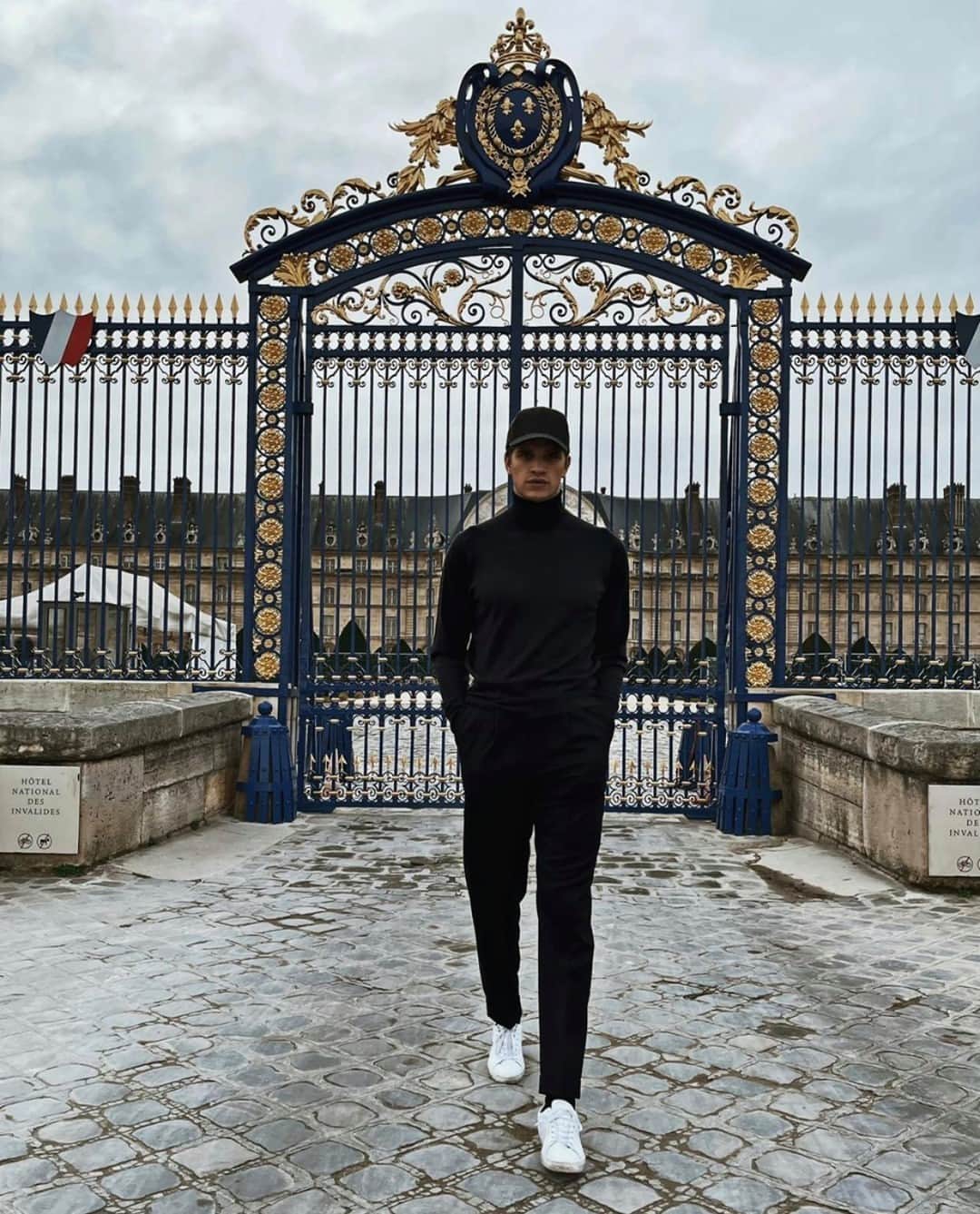 のインスタグラム：「Model Toby Huntington-Whiteley wearing our classic Connell roll neck in Hepburn Smoke while out in Paris today. Head to www.johnsmedley.com to explore more of our classic styles.」