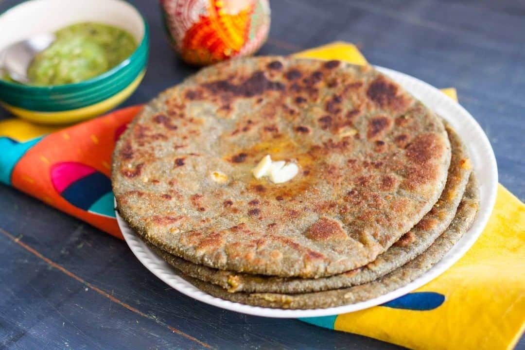 Archana's Kitchenさんのインスタグラム写真 - (Archana's KitchenInstagram)「Nutty Aloo Paratha Recipe is a wonderful twist to the regular aloo paratha recipe and is a sure-shot crowd pleaser. This recipe includes chopped nuts and raisins along with the classic spiced aloo filling. Try this for your breakfast and tell us how you liked it.  Get the recipe from the smart.bio link in my profile @archanaskitchen . . . . . #recipes #easyrecipes #breakfast #Indianbreakfast #archanaskitchen #healthylifestyle #eating #highprotein #breakfastclub #cheesetoast #cheesechilli #Cheesechillitoast #homemadefood #eatfit #cooking #food #healthyrecipes #foodphotography #recipeoftheday #comfortfood #deliciousfood #delicious #instayum #food」11月26日 12時30分 - archanaskitchen