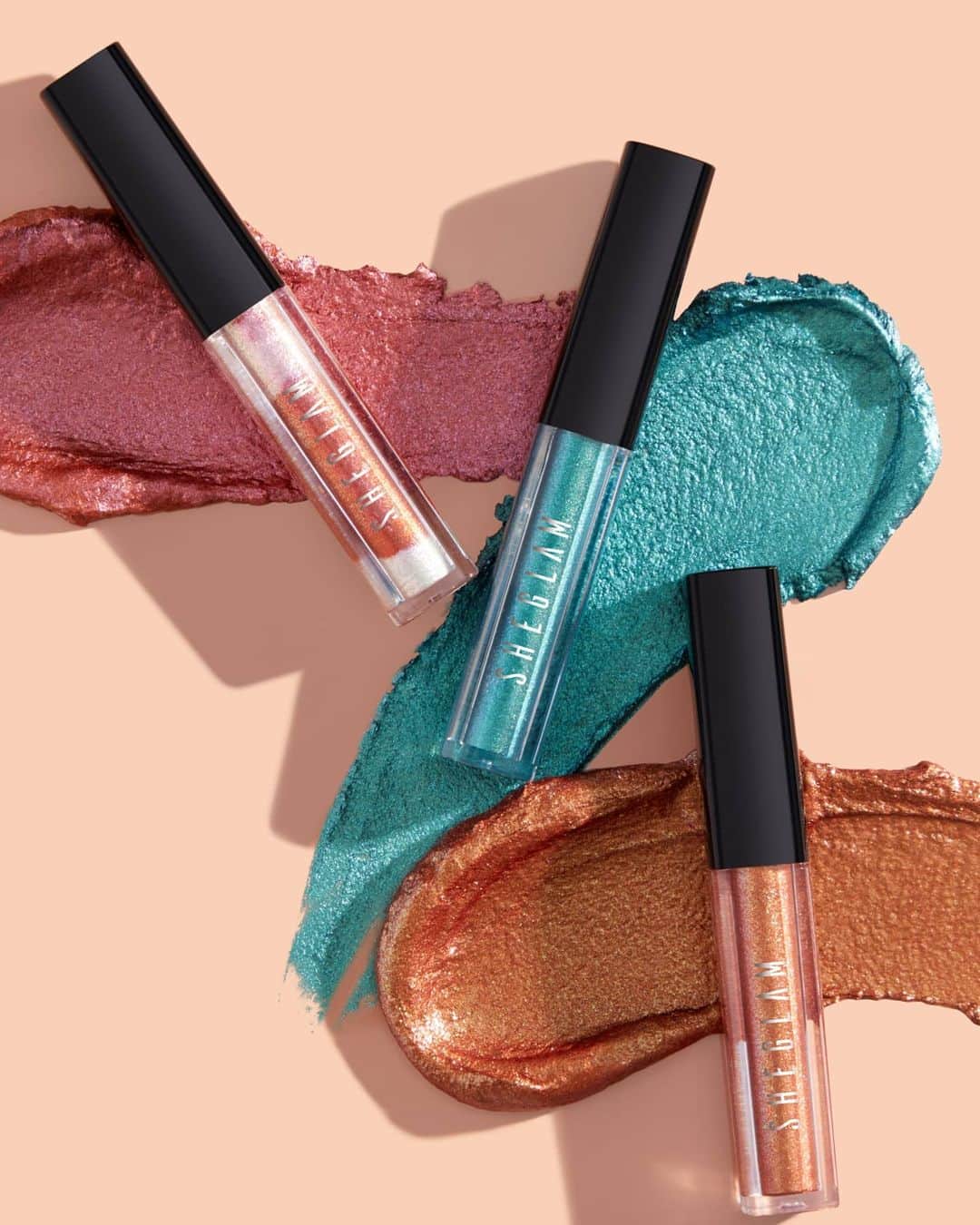 SHEINさんのインスタグラム写真 - (SHEINInstagram)「The lightweight and water-infused texture creates a sheer veil of color that goes on smooth without creasing. Perfect for a natural daytime look or you can layer with other eye shadows to create a sexy, chic look during a night out.  Search SHEGLAM and shop all SHEGLAM products at SHEIN App: SHEGLAM Newly Reformulated - Glitter Liquid Eyeshadow Trio - GREEN DAZE $5 SHEGLAM Newly Reformulated - Glitter Liquid Eyeshadow Trio - SEASIDE LOUNGE $5 SHEGLAM Newly Reformulated - Glitter Liquid Eyeshadow Trio - PURPLE ILLUSION $5  Currently available at SHEIN AR/US/MX/UK/FR/DE/IT/ES/NL/SE/BR/TH/SG/NZ/CA/PL/IL/MA」11月26日 21時15分 - sheinofficial
