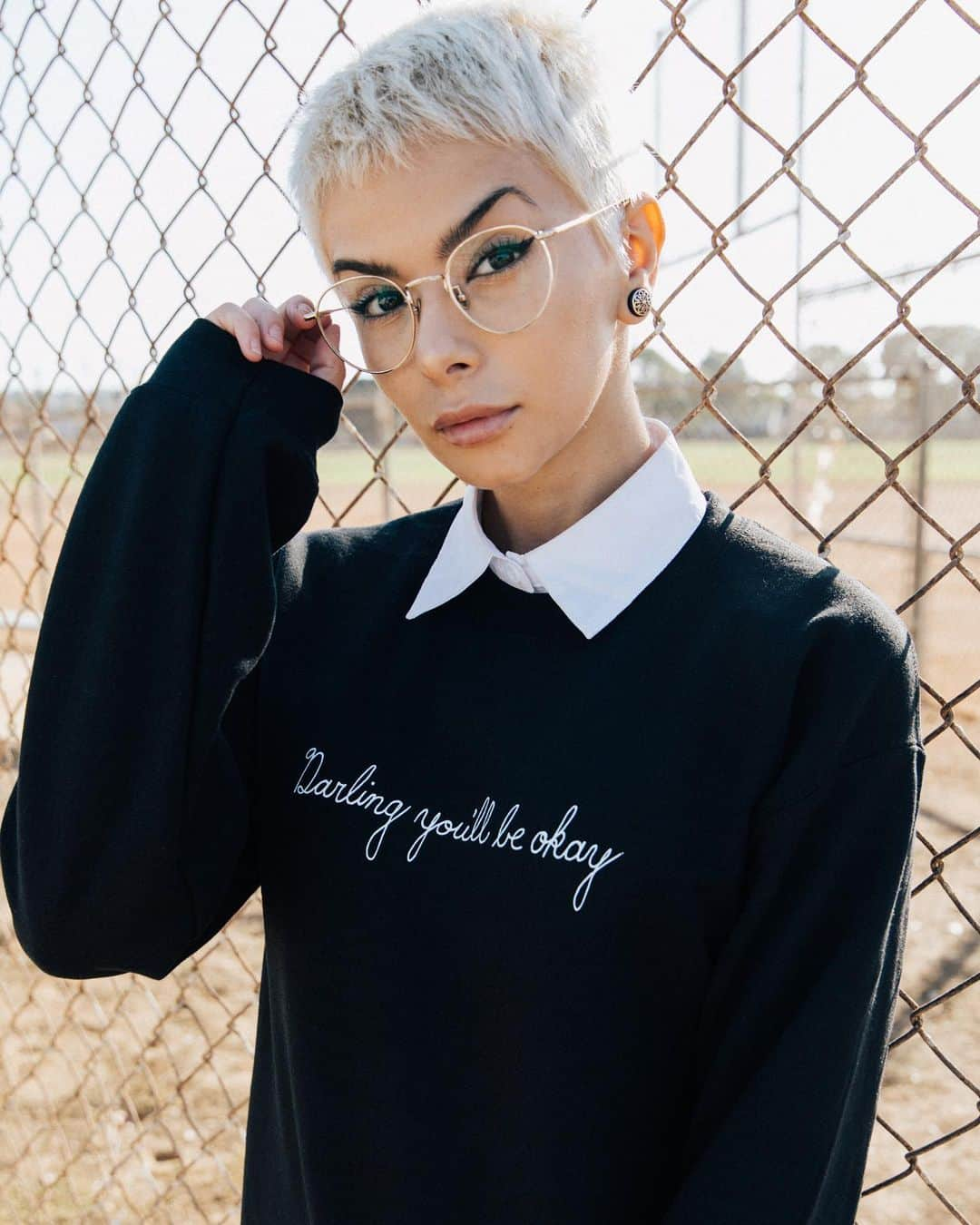 ピアス・ザ・ヴェイルのインスタグラム：「Darling you’ll be okay 🖤 New merch drop available now in our store  Model: @alexisjelenich  Photos: @celinakenyon  *Lyrics handwritten by Vic」