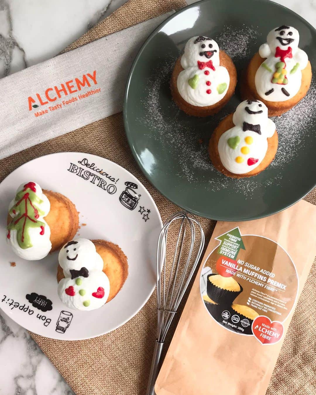 Li Tian の雑貨屋のインスタグラム：「Snowman vanilla muffins ⛄️ that are made healthier thanks to the premix from @alchemy_foods , which has launched a series of premix products blended with Alchemy Fibre, a good source of dietary fibre, with no added sugar and are trans-fat free with no cholesterol.   Each premix is printed with a fail proof recipe at the back and you can scroll to the last pic to check out the full variety from pancake to cookie mixes!  It takes less than 10min to send everything into the oven and you can have something to impress your friends and guests.   Shop for more on www.alchemyfoodtech.com   • • #dairycreamkitchen #singapore #desserts #igersjp #yummy #love #sgfood #foodporn #igsg #ケーキ  #instafood #beautifulcuisines #sgbakes #bonappetit #cafe #cakes #bake #sgcakes #スイーツ #feedfeed #pastry #sgcafe #cake #homebaker #stayhomesg #homebake #tea #muffins」