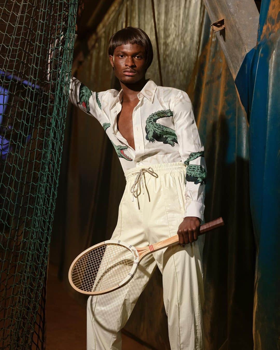 カリーヌ・ロワトフェルドのインスタグラム：「Arthur & Jeanne 🐊 For this editorial in the latest edition of @crfashionbook, I was inspired by legendary tennis player Arthur Ashe and his wife Jeanne Moutassamy-Ashe. Shot by @reto.schmid and styled by @edem.dl, clothing @lacoste by @louisetrotter. #CR17」