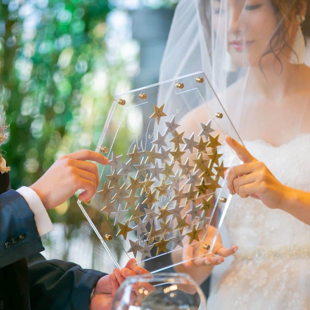 KIYOMIZU京都東山 公式さんのインスタグラム写真 - (KIYOMIZU京都東山 公式Instagram)「. ゲスト全員参加型のあたたかな結婚式を♡  ウェルカムスペースには スタードロップスを設置し ゲストと一緒に作り上げる結婚証明書に*　 . ---------------------- . @kiyomizu_kyoto_higashiyama をフォローし 【#kiyomizu京都東山】で検索してくださいね❖ . #スタイルズ花嫁 #kiyomizu花嫁  #dress #kyoto #kiyomizu #wedding #ウェディングレポ #チャペル #ブライダルフェア #プレ花嫁 #卒花 #結婚式 #結婚式場 #結婚式準備 #京都 #京都花嫁 #関西花嫁 #京都婚 #令和花嫁  #大人花嫁 #DRESSY花嫁 #ウェディングアイテム #ウェルカムスペース #人前式 #花嫁diy #会場コーディネート #オリジナルウェディング #結婚証明書 #スタードロップス」11月30日 17時11分 - kiyomizu_kyoto_higashiyama