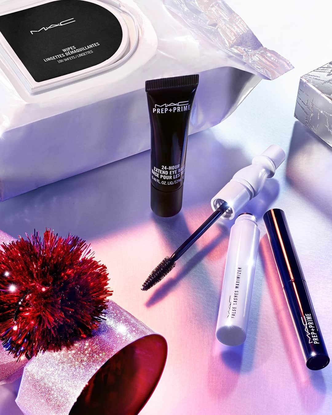 のインスタグラム：「Prime to shine ✨! Make their holiday look last and last with M·A·C must-haves like Prep + Prime Lip, Prep + Prime 24-Hour Extend Eye Base, False Lashes Maximizer and Bulk Wipes. #MACFrostedFirework #MACHoliday」
