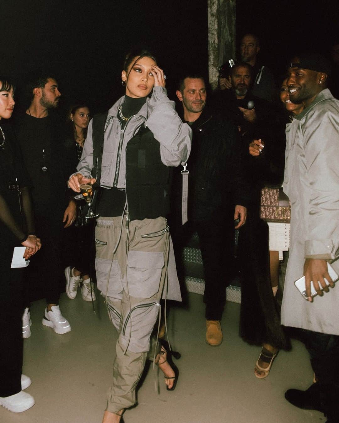 タトラスのインスタグラム：「@bellahadid in TATRAS✖️RIOT HILL from last years Paris Fashion Week. Inner jacket: Utility Cargo Jacket Down vest: Kamikaze Down Vest Pants: Cargo Pocket Pants   #Tatraspeople #tatrasofficial」