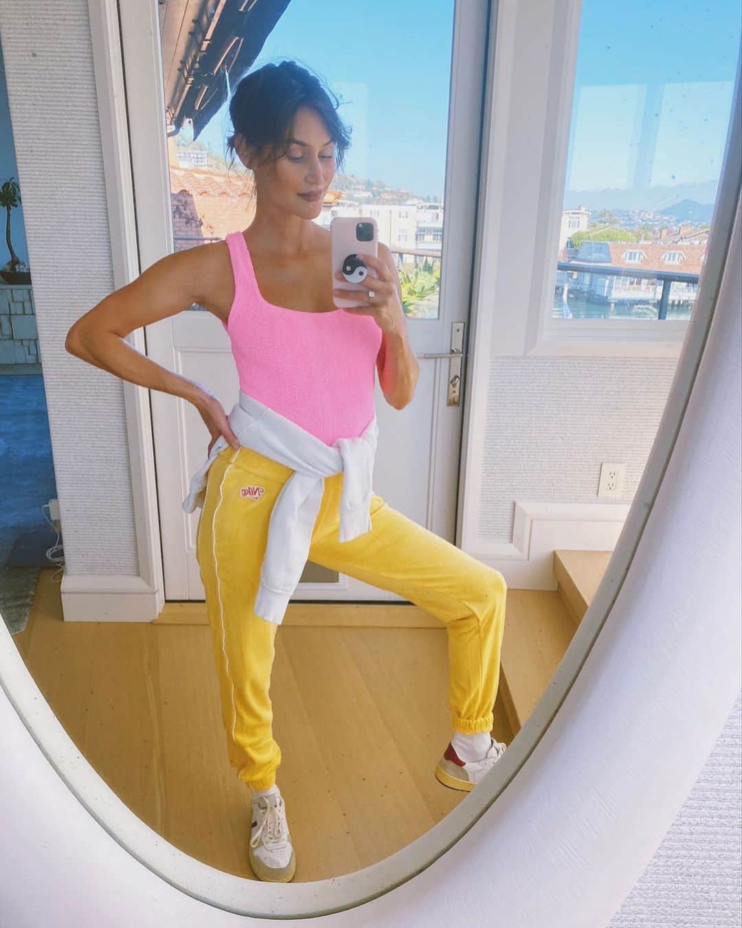 ダニジョーのインスタグラム：「Picture me Strollin’ 🏄‍♀️ mama @danielleasnyder in the bubblegum pink @hunzag one piece styled as a bodysuit 〰️ Shop the swim collection at dannijo.com 🛒」