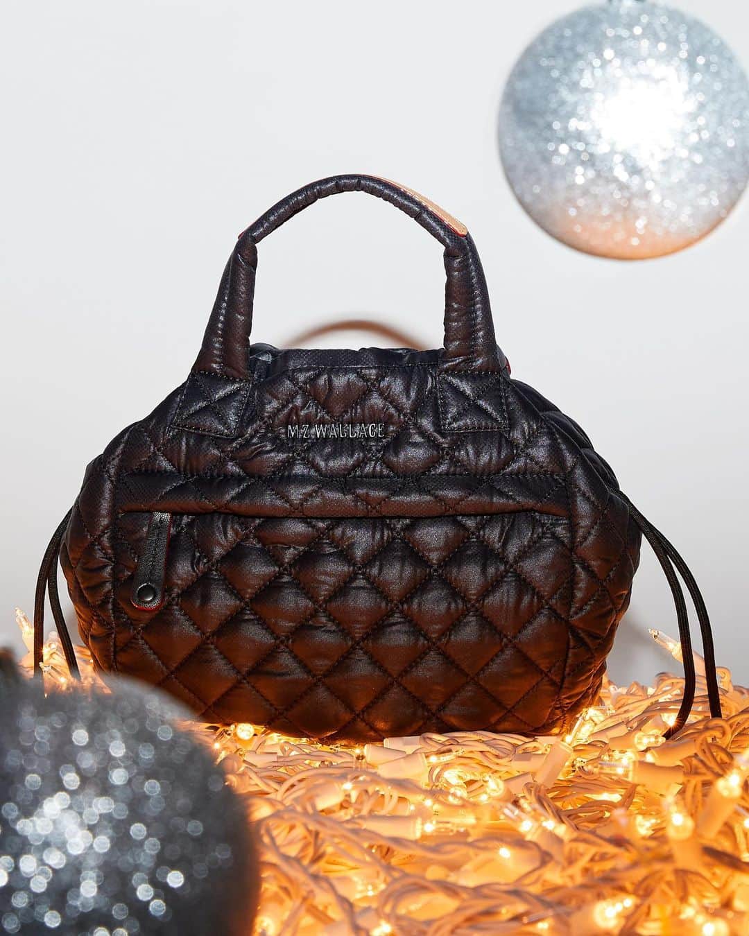 MZウォレスのインスタグラム：「It's here! 12 whole days of exciting surprises, starting with this brand new style, a scaled-down version of our fan-favorite Drawstring Bucket Bag. Head to our stories to get a closer look and tap to shop now!   ✨Check back tomorrow for another reveal.✨」