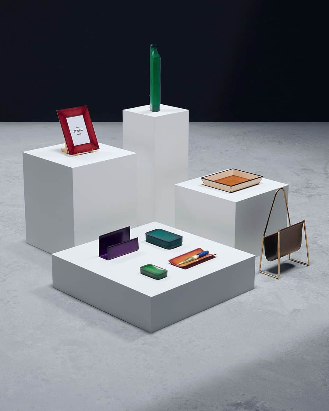 ベルルッティのインスタグラム：「- THE #BERLUTI VIBRANT HOLIDAYS BY @kris_van_assche -    This year, Berluti celebrates the end-of-year holidays with the new Home & Office Objects Collection and a selection of emblematics including the new SIGNATURE canvas collection with a colourful patina twist.   For the new Home & Office Objects Collection, Berluti has teamed up with a select group of highly respected European makers, including Werkstätte Carl Auböck, Bottega Ghianda, San Lorenzo Silversmiths and Simon Hasan, commissioning Berluti editions of iconic historic designs by Gae Aulenti, Afra and Tobia Scarpa, Carl Auböck II and III and new work by Simon Hasan, dating from every decade between the 1950’s and 2000’s.   Both functional and statement-worthy, the selection of emblematics highlights the Un Jour Gulliver, the Toujours tote bag, and the new SIGNATURE canvas collection which includes the Séjour card holder, the Explorer backpack and the Nino clutch to name a few.   For the occasion, the Venezia leather takes on a bold, joyful twist with an array of new patinas. Originally created last year especially to restore the upholstery of Pierre Jeanneret’s furniture pieces- and inspired by the rich colours found in the architecture, landscape and foliage of the north Indian city of Chandigarh -, these vibrant new colours include Utopia blue, Acqua blue, Nespola orange, Sunset purple, Rose Garden pink, Simal red and Grass green. Hand-applied to the Venezia leather and Venezia leather details of the SIGNATURE canvas accessories, they enhance every piece with a unique depth of colour.   Available In-Store and on the E-Shop.   Our Stores in France are now open and our teams will be delighted to welcome you.」