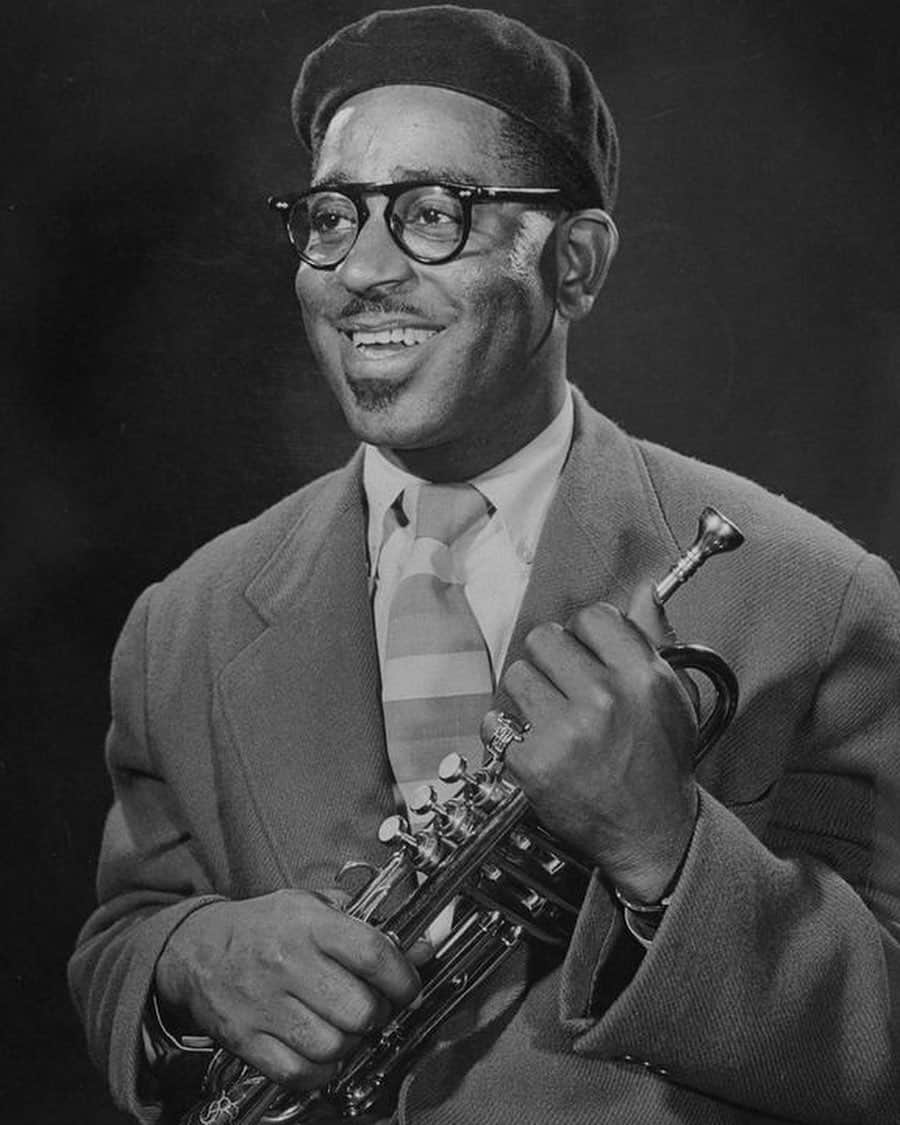 lifeのインスタグラム：「From our October 11, 1948 profile of jazz great Dizzy Gillespie — "Bebop: A New Jazz School Is Led By Trumpeter Who Is Hot, Cool, and Gone" — these classic photos show how Gillespie could expand his neck from his normal size 16 to a size 20 when playing. To spend the day with Dizzy (with an appearance by Ava Gardner!), tap the link in bio. (📷Allan Grant/LIFE Picture Collection)  #dizzygillespie #jazz #bebop #trumpeter #tbt」