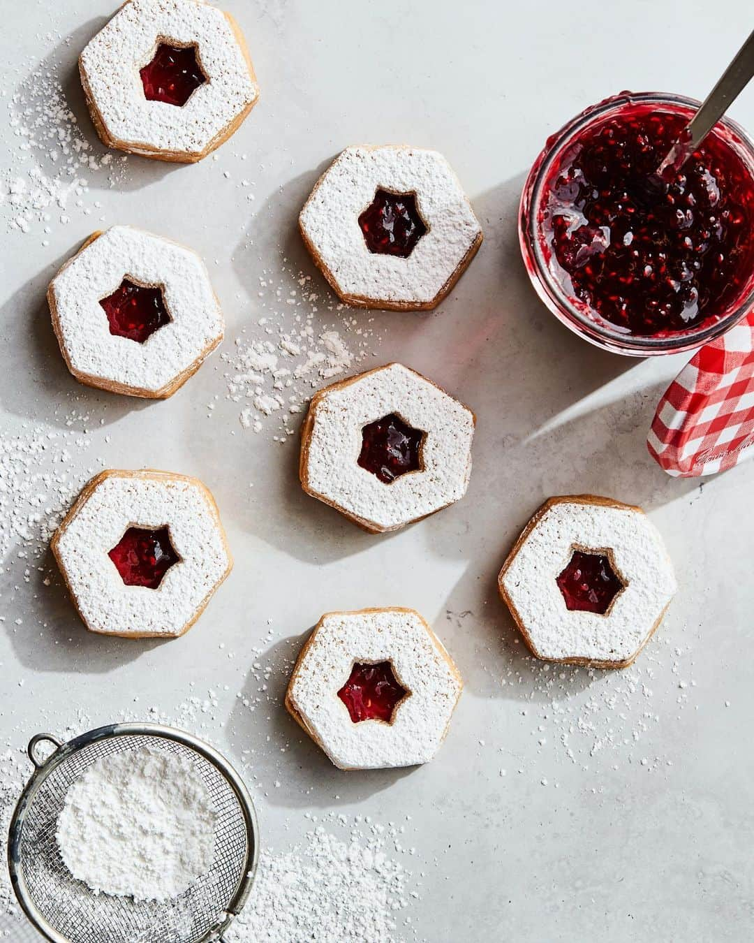 Gaby Dalkinさんのインスタグラム写真 - (Gaby DalkinInstagram)「Guess who’s back with another epic recipe today… my Omi!!! This time we’re making her famous Linzer Christmas Cookies with copious amounts of @bonnemaman_us Raspberry Preserves because OMG THAT STUFF IS WHAT MY DREAMS ARE MADE OF!! Omi used to make these for us every Christmas when we were kids and they are truly perfection! I cannot WAIT until next year when she can make them for me again in real life!! Recipe is below and it’s the perfect way to spend some time in your kitchen this week/weekend. ALSO - bonus, you can re-use / up-cycle the Bonne Maman glass jar and fill it up to gift to your friends and fam. But also I 100% won’t judge you if you keep the cookies for yourselves. FYI - legit any other flavor of Bonne Maman is brilliant in this recipe. I basically tested them all. DON’T JUDGE ME. It’s a tough job but someone’s gotta do it!  3 cups flour 3/4 cup sugar 1 1/2 cups butter (softened) 2 tablespoons water 1/4 teaspoon salt 1 teaspoon vanilla extract 3/4 cup Bonne Maman Raspberry Preserves (or any other of your fav Bonne Maman preserves) Powdered sugar for dusting   Cream together the butter, sugar and vanilla until just combined in a stand mixer.   Add the flour, water and salt and mix on low speed until the dough comes together in a cohesive mass. Turn the dough out onto your work surface and shape into a flat disk. Wrap with plastic wrap and place in the fridge for at least 30 minutes.   Roll the dough out to a uniform 1/4- inch thickness and, using a cookie cutter, cut rounds. Using a smaller cookie cutter, make holes in the middle of half of your rounds.   Place cookies on a parchment lined baking sheet and chill for an additional 15 minutes prior to baking. Preheat the oven to 350 degrees.   Bake the cookies for 20 - 25 minutes, until the edges begin to brown. Once cooked, remove from the oven and allow the cookies to cool to room temperature on a cooling rack.   Dust the cut out cookies with powdered sugar and spread the Bonne Maman Raspberry Preserves on each solid cookie, about 1/2 - 1 tablespoons each. Sandwich your cookies together and serve, or gift to loved ones in an upcycled Bonne Maman jar for the perfect holiday gift 🎁」12月4日 4時49分 - whatsgabycookin