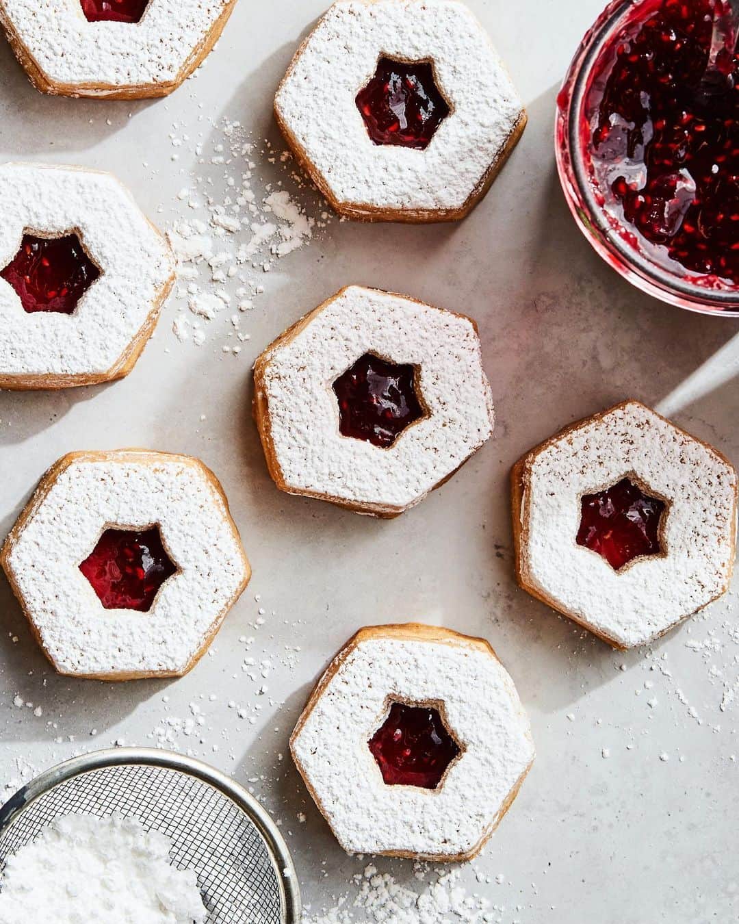 Gaby Dalkinのインスタグラム：「Guess who’s back with another epic recipe today… my Omi!!! This time we’re making her famous Linzer Christmas Cookies with copious amounts of @bonnemaman_us Raspberry Preserves because OMG THAT STUFF IS WHAT MY DREAMS ARE MADE OF!! Omi used to make these for us every Christmas when we were kids and they are truly perfection! I cannot WAIT until next year when she can make them for me again in real life!! Recipe is below and it’s the perfect way to spend some time in your kitchen this week/weekend. ALSO - bonus, you can re-use / up-cycle the Bonne Maman glass jar and fill it up to gift to your friends and fam. But also I 100% won’t judge you if you keep the cookies for yourselves. FYI - legit any other flavor of Bonne Maman is brilliant in this recipe. I basically tested them all. DON’T JUDGE ME. It’s a tough job but someone’s gotta do it!  3 cups flour 3/4 cup sugar 1 1/2 cups butter (softened) 2 tablespoons water 1/4 teaspoon salt 1 teaspoon vanilla extract 3/4 cup Bonne Maman Raspberry Preserves (or any other of your fav Bonne Maman preserves) Powdered sugar for dusting   Cream together the butter, sugar and vanilla until just combined in a stand mixer.   Add the flour, water and salt and mix on low speed until the dough comes together in a cohesive mass. Turn the dough out onto your work surface and shape into a flat disk. Wrap with plastic wrap and place in the fridge for at least 30 minutes.   Roll the dough out to a uniform 1/4- inch thickness and, using a cookie cutter, cut rounds. Using a smaller cookie cutter, make holes in the middle of half of your rounds.   Place cookies on a parchment lined baking sheet and chill for an additional 15 minutes prior to baking. Preheat the oven to 350 degrees.   Bake the cookies for 20 - 25 minutes, until the edges begin to brown. Once cooked, remove from the oven and allow the cookies to cool to room temperature on a cooling rack.   Dust the cut out cookies with powdered sugar and spread the Bonne Maman Raspberry Preserves on each solid cookie, about 1/2 - 1 tablespoons each. Sandwich your cookies together and serve, or gift to loved ones in an upcycled Bonne Maman jar for the perfect holiday gift 🎁」