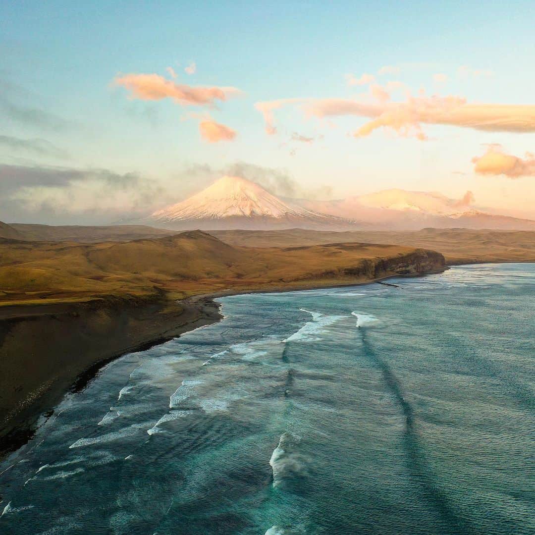クリス・バーカードのインスタグラム：「The remnants of the small broken plane pushed to the side of the dirt runway are a rude awakening for the arriving traveler. The Aleutians can reward you in many ways but there will always be something taken and often left behind. Even if just a memory of how resilient the people are that call this home.」