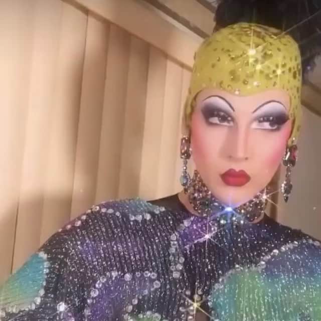 のインスタグラム：「Reposting the glorious @violetchachki wearing a #piersatkinson feather pom and giving us some serious seasonal sparkle ✨ ”Possibly my favorite look from my 2021 calendar! So much love went into the art direction and styling of these images! I’m so thankful for everyones support 💜 Get your calendar via the link in my @violetchachki bio! 💋”  Wearing @thelastfolliescloset @prada @houseofemmanuele @houseofcanney @piersatkinson @theresidencyexperience」