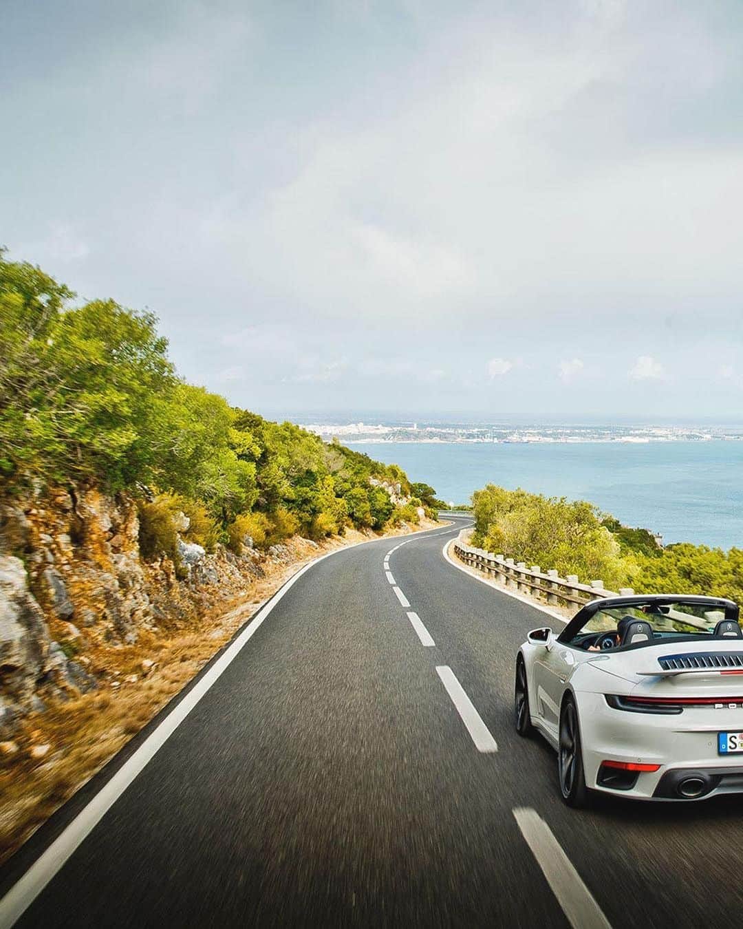 Porscheさんのインスタグラム写真 - (PorscheInstagram)「Modern vs. traditional. Dynamic vs. slow-paced. Rich vs. simple. Sea vs. mountains. The new Curves Magazin displays the most beautiful opposites on the routes of Portugal.  (📸 @curvesmagazin) __ 911 Turbo S Cabriolet: Fuel consumption combined: 11,3 l/100 km; CO2 emissions combined: 257 g/km I https://porsche.click/DAT-Leitfaden I Status: 12/2020」12月6日 5時01分 - porsche