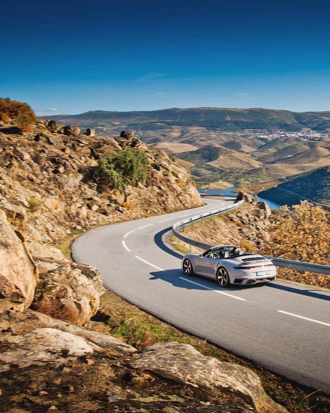 Porscheさんのインスタグラム写真 - (PorscheInstagram)「Modern vs. traditional. Dynamic vs. slow-paced. Rich vs. simple. Sea vs. mountains. The new Curves Magazin displays the most beautiful opposites on the routes of Portugal.  (📸 @curvesmagazin) __ 911 Turbo S Cabriolet: Fuel consumption combined: 11,3 l/100 km; CO2 emissions combined: 257 g/km I https://porsche.click/DAT-Leitfaden I Status: 12/2020」12月6日 5時01分 - porsche