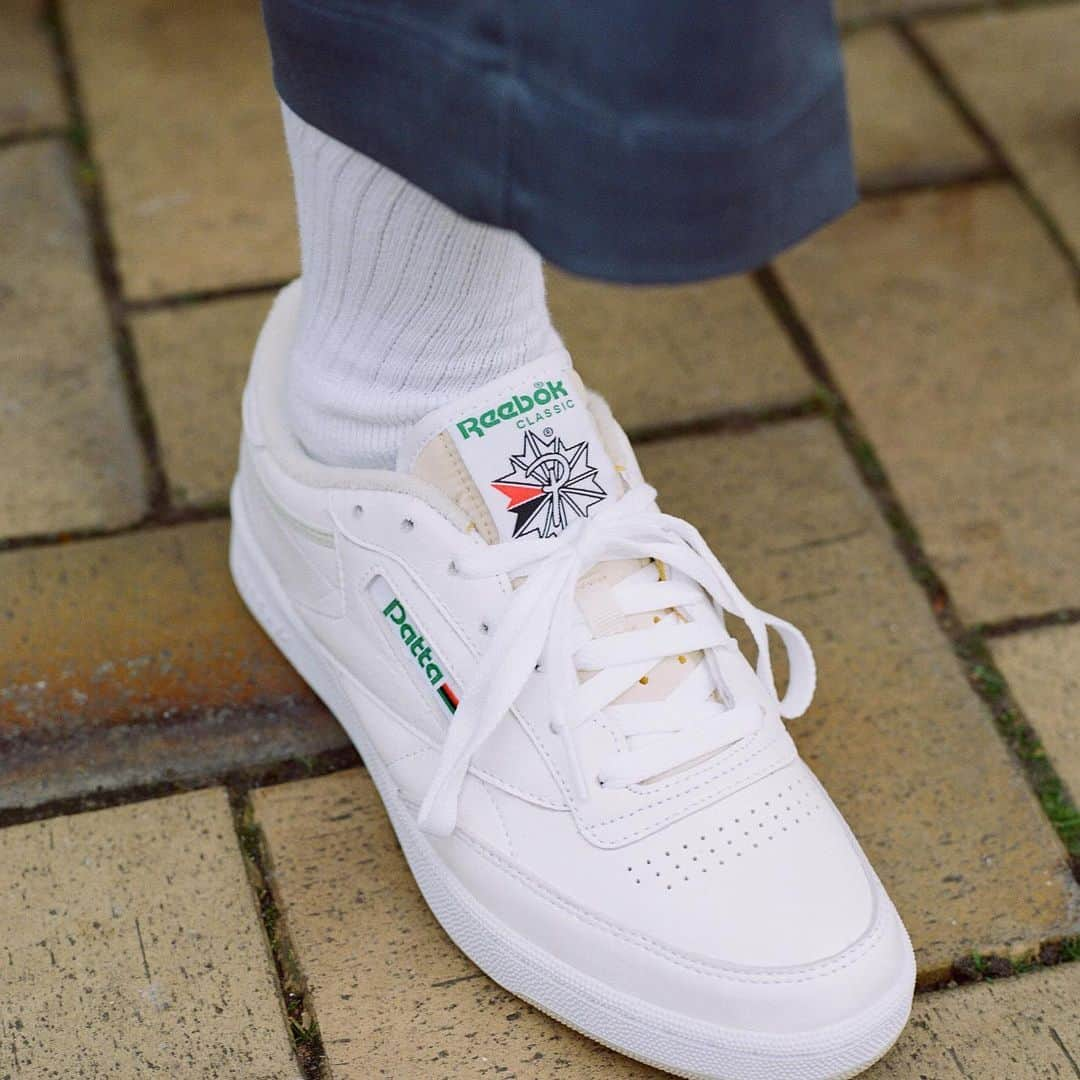 Reebok classicのインスタグラム：「Made exclusively for @patta_nl, the Reebok x Patta Club C 85 features Patta branding and the Pan-African flag on the tongue in place of the traditional Reebok woven label with the Union Jack. The Red, Black & Green flag was conceived by Marcus Garvey exactly 100 years ago and stands for Pan- African unity.   Part of the proceeds from this shoe will be donated to local organizations for communities of the African Diaspora, @the_blackarchives from Amsterdam, London’s @sistahspace_ & @thegoodneighborhoodcollective in Milan.   The Reebok x Patta Club C 85 is available now exclusively at Patta stores.」