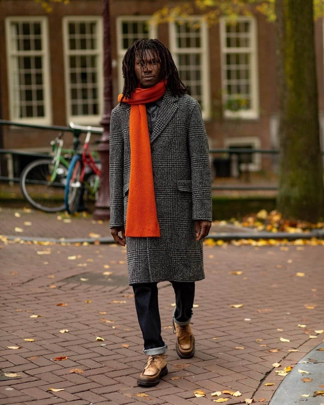 MR PORTERのインスタグラム：「Based in Amsterdsam, Mr @renwejules is a photographer and ambassador for Mr P., our in-house label.  We invited him to try out the new @mrp collection out in his home city and take a few shots in the process. ⁠Here, he's pictured in the new-season Prince of Wales checked coat, Selvedge jeans and Jacques leather-trimmed desert boots. Shop his look via the link in bio. #MrPmyway」