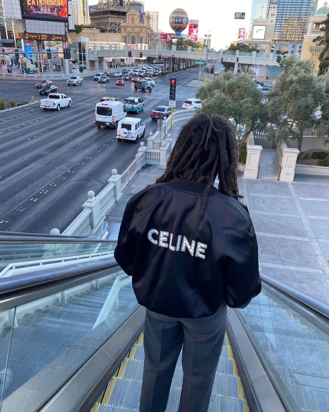 MR PORTERのインスタグラム：「The Dancing Kid at dawn. Actor and producer Mr @lukasabbat winds down after a Vegas night in CELINE HOMME. Shop our exclusive pop-up via the link in bio. @celine  Luka wears: CELINE HOMME - Celine Teddy-Printed Studded Satin Jacket CELINE HOMME - Striped Wool Skate Pants」