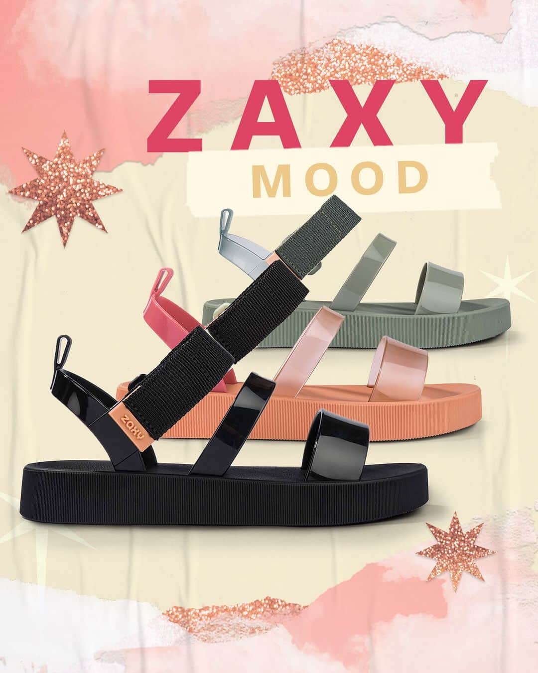 のインスタグラム：「Procurando um presente? Opção é o que não falta por aqui! A #ZaxyMood é uma sandália flatform que deixa qualquer visual mais moderninho. Que tal mandar esse mimo pra aquela amiga que você ama?#FimDeAnoZaxy  #ZaxyMood - R$79,99  Compre agora mesmo pelas tags no post, pelo link na bio ou na nossa loja online www.zaxy.com.br  #pracegover #pratodosverem: Na foto, temos o fundo rosinha claro com alguns rasgos e estrelas com glitter. No centro, temos 3 cores da Zaxy Mood, um modelo de sandália que possui três tiras frontais com fechamento traseiro.」