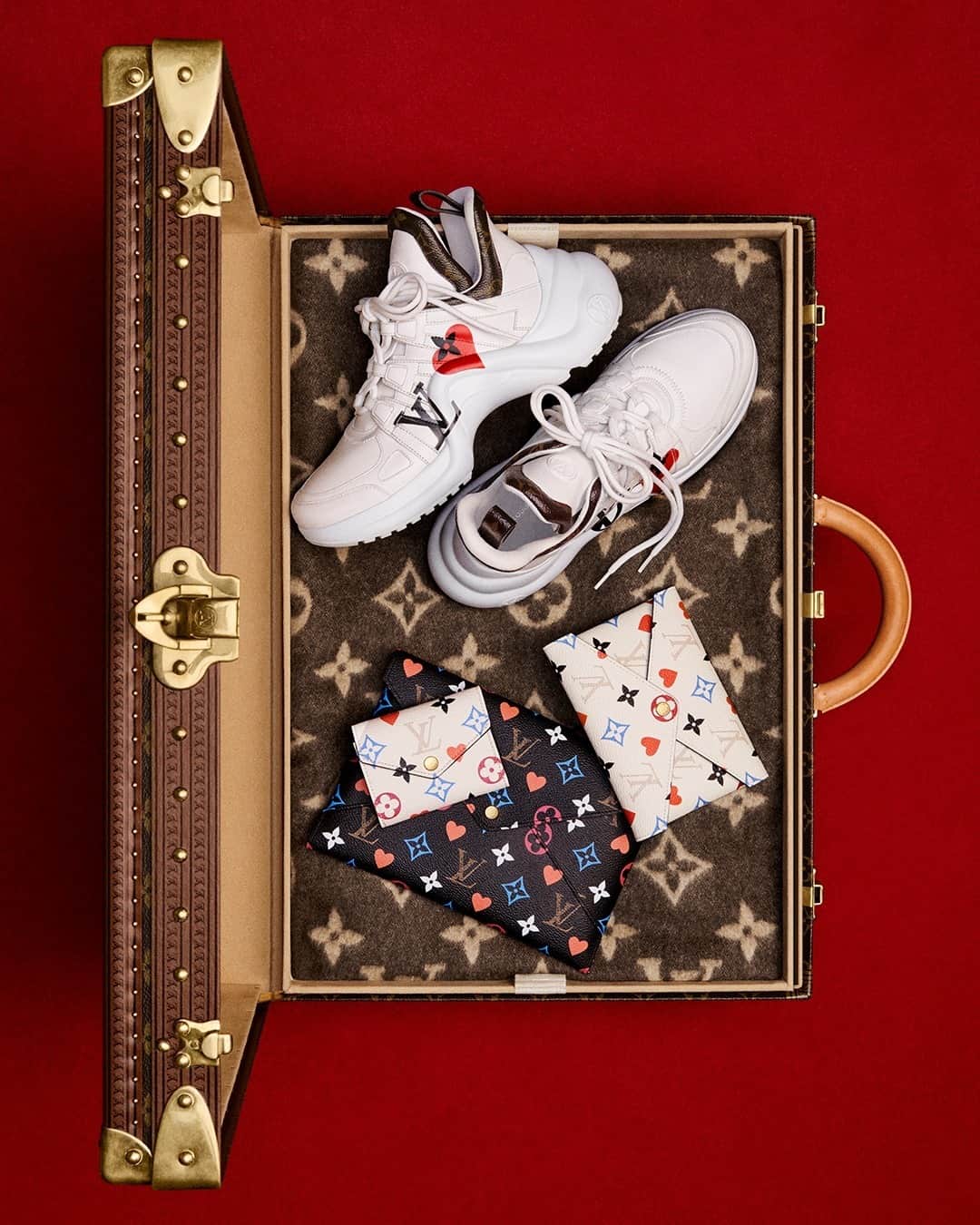 Louis Vuitton on X: Festive accents. #LouisVuitton's Silhouette Ankle  Boots take on the season's SINCE 1854 jacquard for added flair. Find more  #LVGifts inspiration at   / X