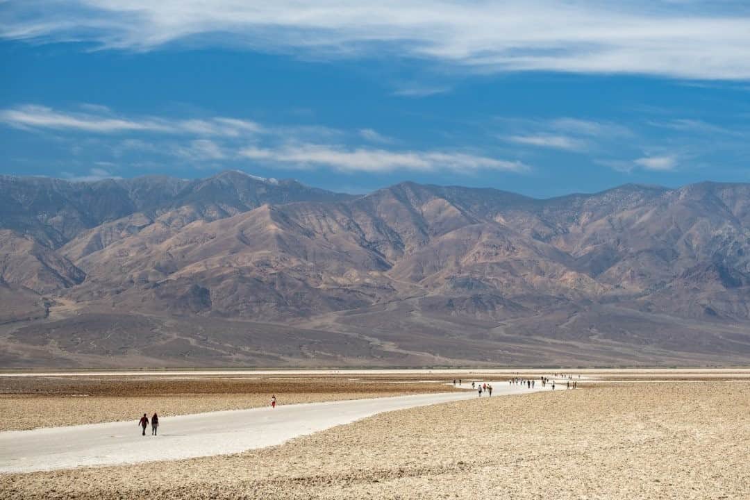 National Geographic Travelさんのインスタグラム写真 - (National Geographic TravelInstagram)「Photo by @KristaRossow / Visitors look tiny in the vast landscape at Badwater Basin in Death Valley National Park. Badwater is the lowest point in North America at 282 feet (86 meters) below sea level. For more travel imagery, follow @KristaRossow. #BadwaterBasin #DeathValley #NationalPark #California」12月8日 12時34分 - natgeotravel