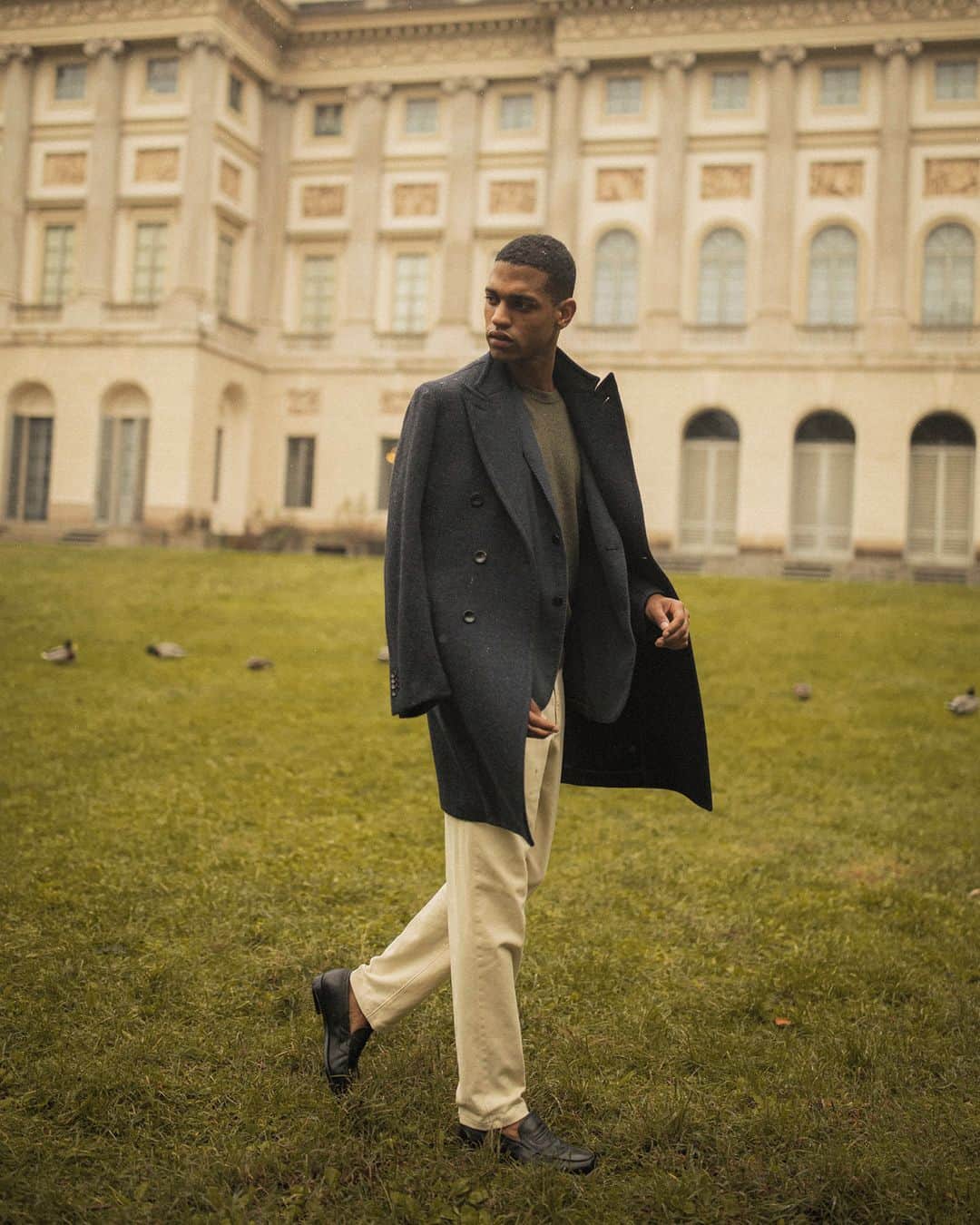 のインスタグラム：「A perfect balance of what is structured and what is not#Milano⁣ ⁣ #FW2020 #Boglioli #campaign #coat #VillaReale #garden #dream」