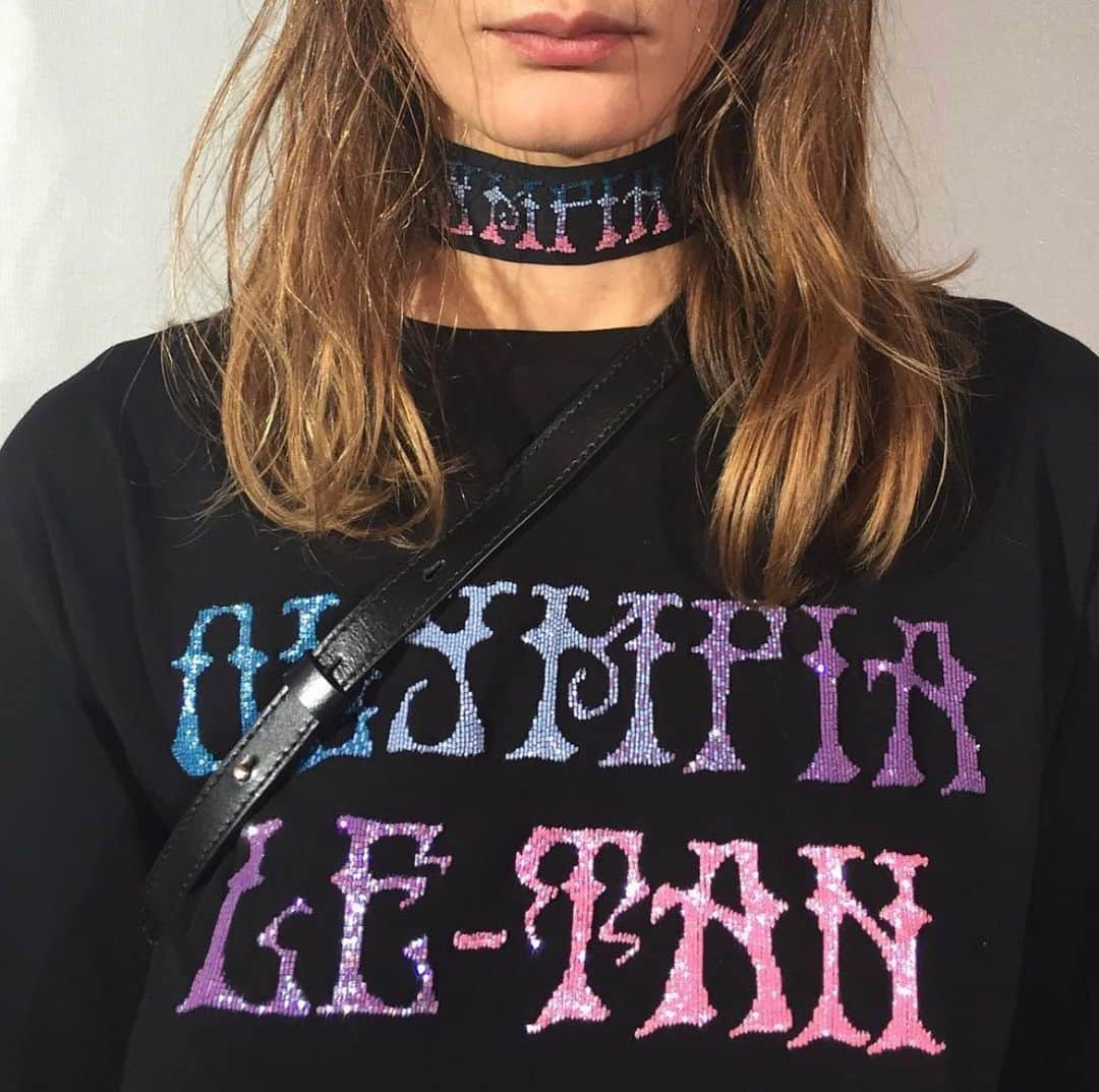 オランピアルタンのインスタグラム：「OLT psychedelic collection beaded logo tee & matching choker 💕💜💙 (forgot we did this, did you force me @audechomette 🤔?) #RickGriffin inspired font hand embroidered by @max.modesti 🪡 #OLTss17 #turnontuneindropout」