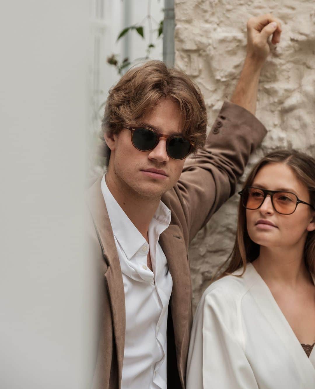 のインスタグラム：「Artist, @eleanorherbosch, and web designer, @thomaslanghendries share a similar approach in their work of finding a balance of traditional principles while still allowing modern elements to flow organically within their work. #OPClassics  Photo: @tibods⁠ –⁠ Eleanor wears Nilos and Thomas wears Gregory Peck Sun.」