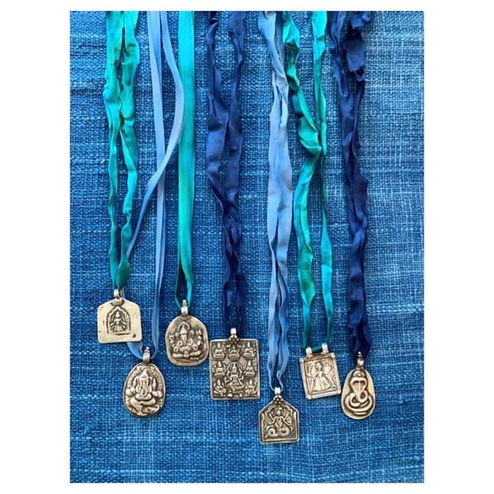 のインスタグラム：「✨Our silk necklaces are back in stock✨⁠ Vintage silver and gold protective amulets from Rajasthan, India, paired with silk tie-dyed ribbons. ⁠ These traditional one-of-a-kind amulets are often tied around necks, forearms, and wrists to safeguard the wearer- a perfect gift for you or yours.⁠ ~ link in bio for more ~」