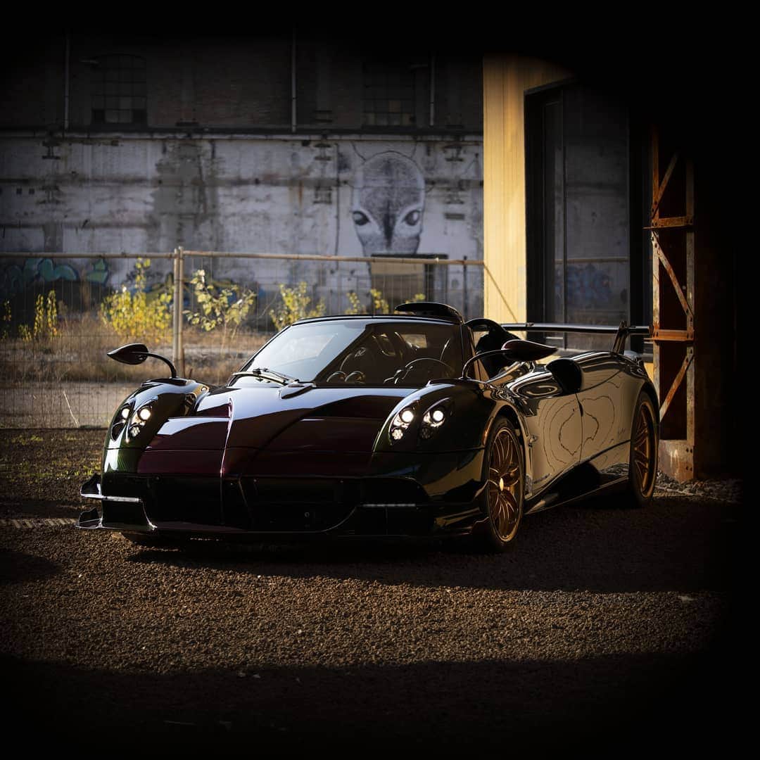パガーニ・アウトモビリのインスタグラム：「The ideal setting for this specimen of Roadster BC.  It was once a key piece in the Italian industry, today the @parco_innovazione is a prime example of urban regeneration, but also an open air gallery to see some amazing works of street art and land art.   #pagani #huayra #roadaterbc #ParcoInnovazione」
