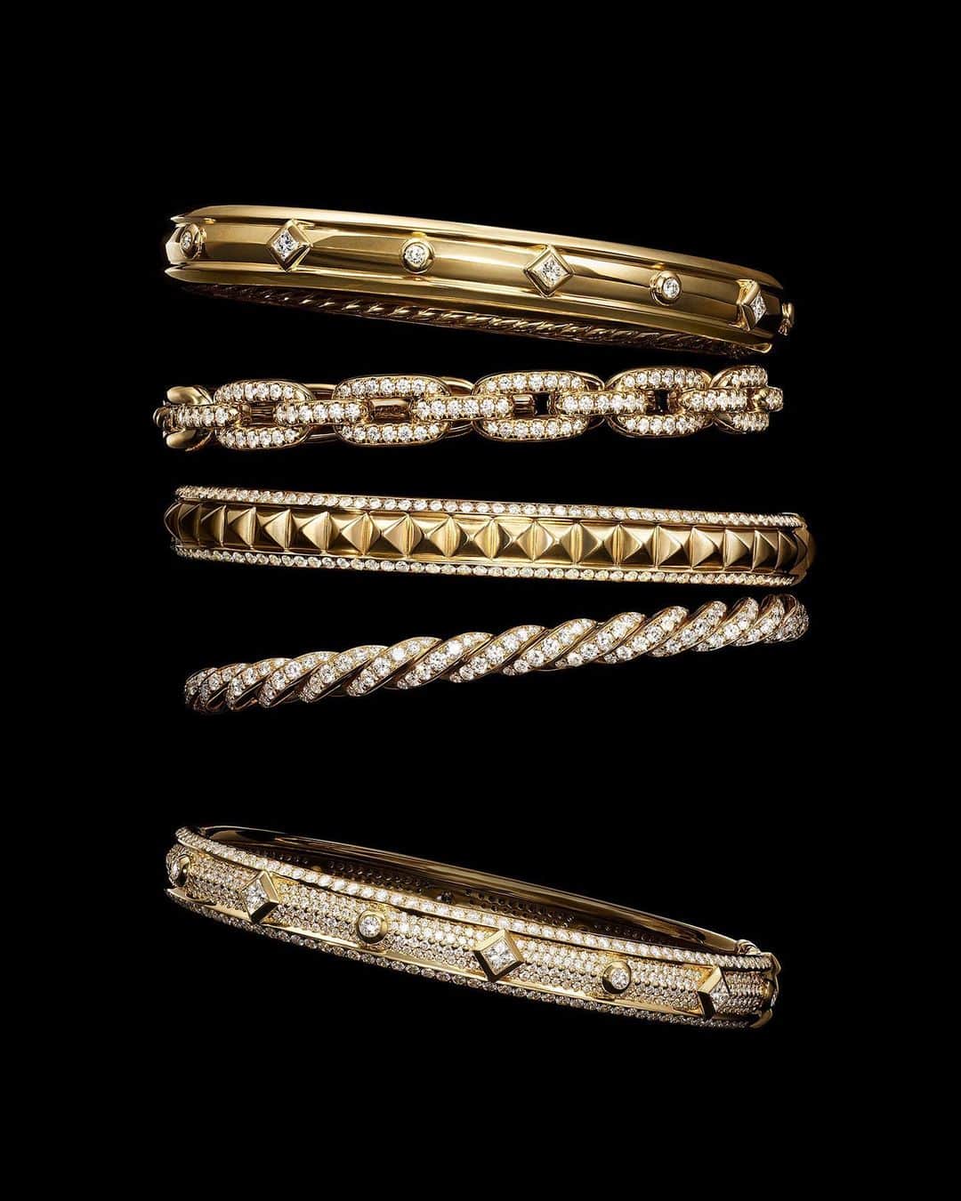 デビッドヤーマンのインスタグラム：「Golden expressions. Layer signature Cable, chains and faceted metal to reflect your style and individuality. #TapToShop #DavidYurman」