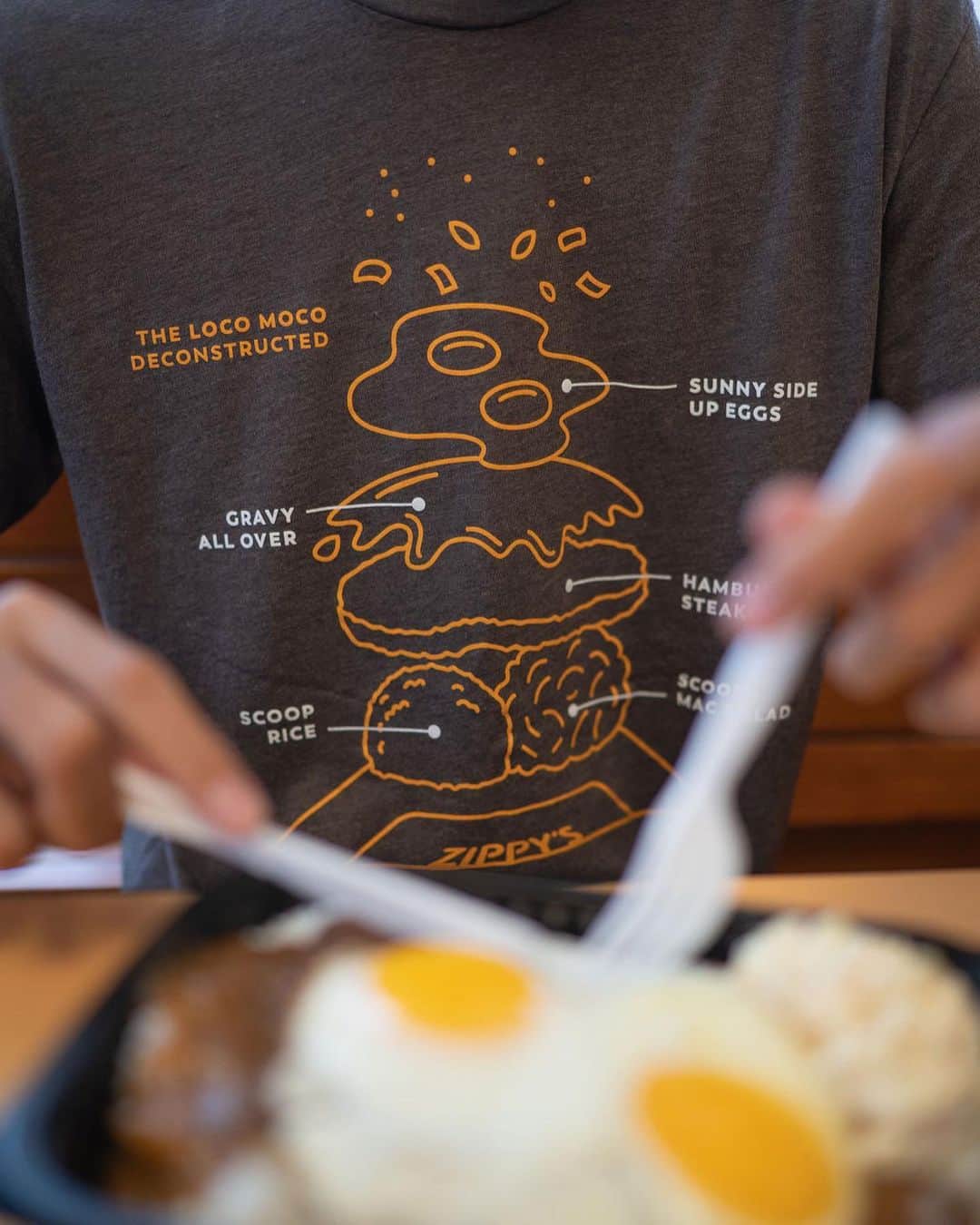 Zippy's Restaurantsのインスタグラム：「We restocked Zippyʻs branded t-shirts like the “Deconstructed Loco Moco” on Zippys.com to help the last-minute holiday shoppers. Get a tee and Zippyʻs x Ari South Hapawai mask for the local food lover in your life.」