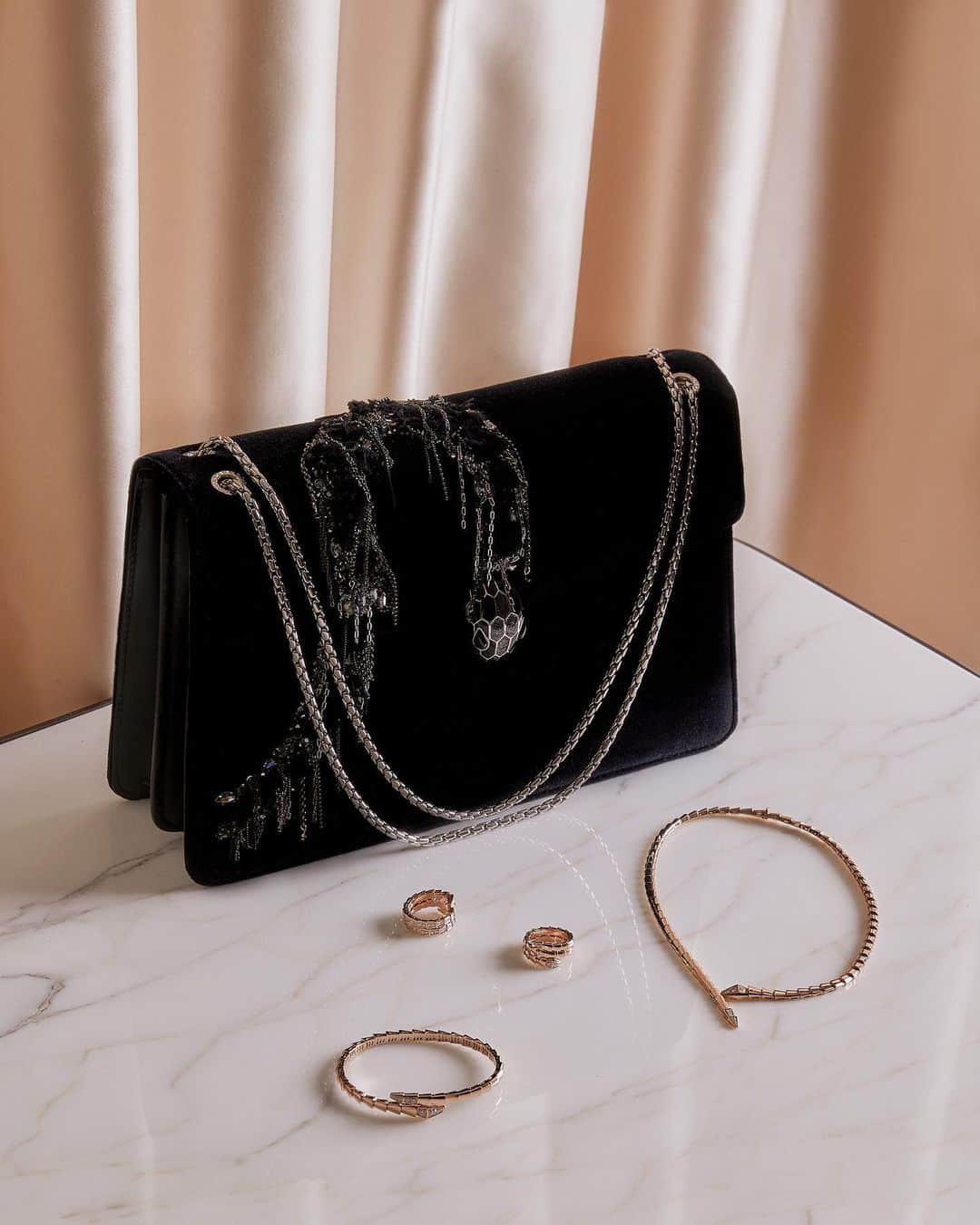 Harrodsのインスタグラム：「Sumptuous embellished velvets define @Bulgari’s holiday #Serpenti accessories, exclusive to Harrods, which capture the opulence and celebration of the festive season – and elevate any outfit they adorn.  Find the collection in the new #Bvlgari boutique in Luxury Accessories on the Ground Floor. Can’t make it to the store? Shop the collection remotely through our Personal Shopping service.  #Harrods #HarrodsFashion #HarrodsExclusive #BvlgariAccessories」