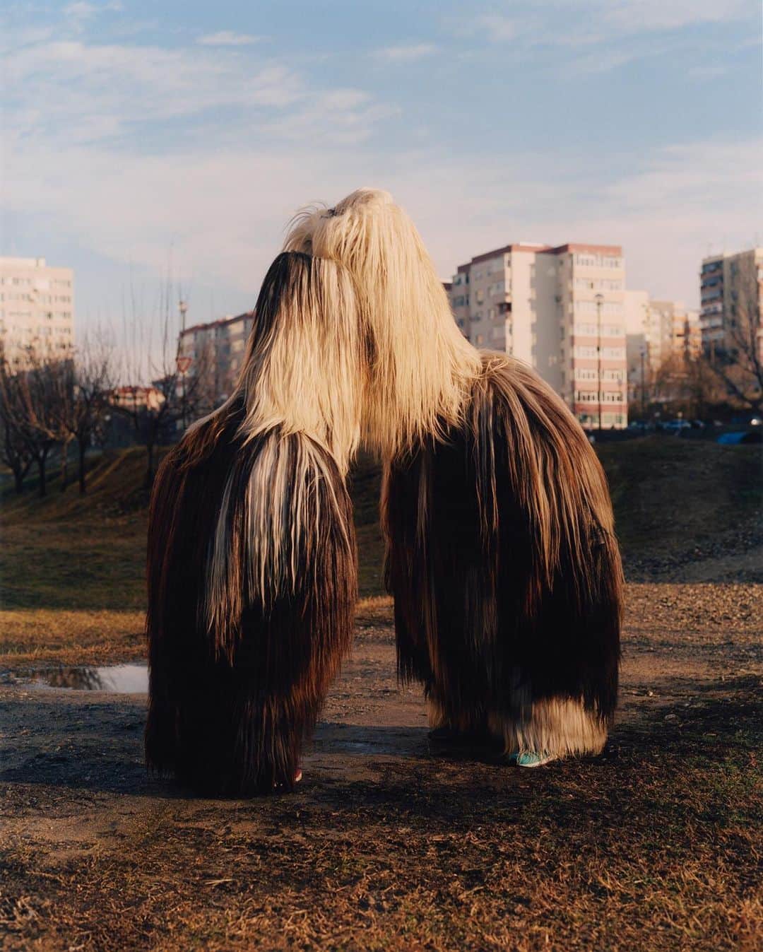 AnOther Magazineさんのインスタグラム写真 - (AnOther MagazineInstagram)「Vibrant photographs capturing Bulgaria’s Kukeri tradition, by @theo.cottle⁠⠀ ⁠⠀ Every year in the dead of winter, hundreds of Bulgarians, dressed in elaborate and hairy costumes, flock to the city of Pernik for the Surva festival, one of Europe’s last remaining folk traditions. Theo Cottle’s debut book, Generation/поколение, documents the people, costumes and customs which bring this enthralling tradition to life. Link in bio 📲⁠⠀」12月11日 7時45分 - anothermagazine