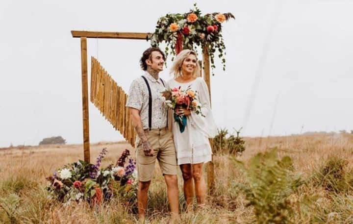 ミナのインスタグラム：「Sustainable wedding can be cool af and this retro bohemian inspired shoot is the perfect example! All the elements in this shoot are sustainable. Our Gabrielle dress is made from peace silk that's made in England. Check out the full feature on @festivalbrides. Link in bio. ⁠ ⁠ Photography @kissinlight ⁠ Props/Styling: @borrowthemoon ⁠ Floristry: @maia_sellen_floral_designs ⁠ Hair and Makeup: @hannahcascarinomua ⁠ Model:@olasuddrey ⁠ Tableware: @fabulouscompany ⁠」