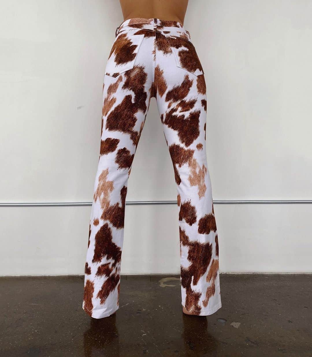 We Wore Whatのインスタグラム：「Cowhide has been at the core of @shopweworewhat since 2018 and it’s about freaking time we added it to denim! The baby boot cowhide jean is part of a limited stock special item launch happening on Monday!! Like I said, categorically into cowhide 🐮」