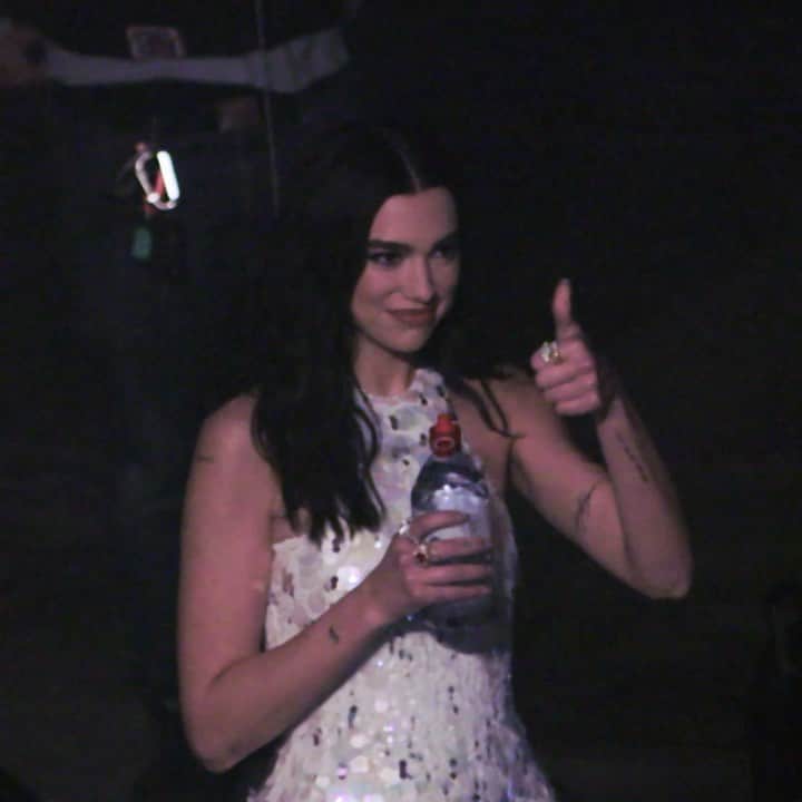 evianのインスタグラム：「Behind the scenes of #Studio2054 🎉 Check out this unseen footage giving you a glimpse of the making of the legendary event starring @dualipa and our 100% rPET bottles. It was a night to remember and one we’re so proud to have shared with her!  #evian #evianwater #evianxdualipa #stayhydrated #studio2054 #bottlesmadefrombottles」