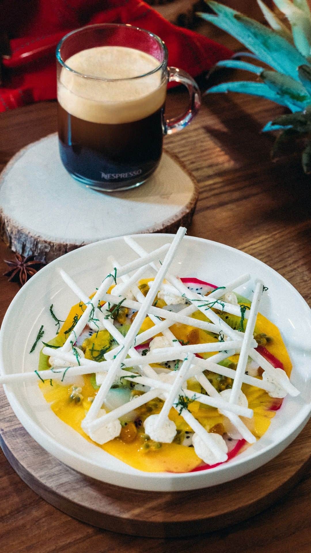 Nespressoのインスタグラム：「Grab your ingredients, your cup of coffee, and get in the holiday spirit!   Chef @jeanimbert guided us through the process of making his exotic and festive pavlova, inspired by our Limited Edition Amaretti capsule.   👉🏻 The full recipe is available on our #NespressoRecipe Website (link in bio).  ☕ Tag @nespresso #NespressoEditions in your creations so we can share our favourites!」