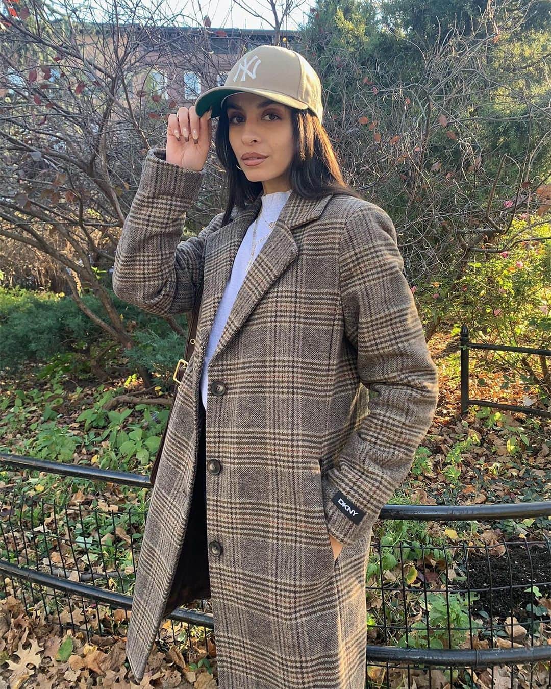 DKNYのインスタグラム：「@Danie.Sierra wears the #DKNY Plaid Car Coat on her morning stroll. #DKNYSTATEOFMIND」