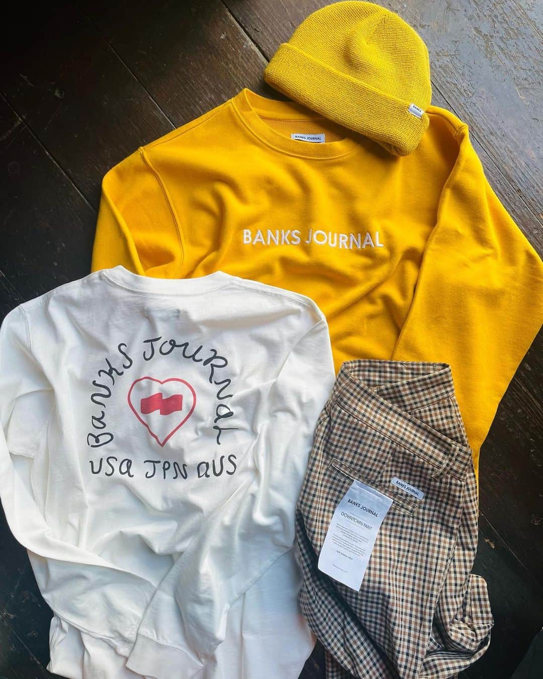 PORT of CALL Cafe&Store Tokyoのインスタグラム：「﻿ #pocdstyle﻿ -New Arrival-﻿ @banksjournal﻿ 👕Heart Signs L/S Tee Shirt﻿ (Beige,Off White)﻿ 🧥Label Crew﻿ (Saffron,Dirty Black,Sarmon,Bronze)﻿ 👖Down Town Check Pant﻿ (Baked Clay)﻿ Stocked @poc_daikanyama﻿ ＠banksjournal 定番ロゴクルーネックスウェット。﻿ カラー豊富でギフトにもナイスアイテム🎁💕﻿ #banksjournal  #banks #new #collection #portofcalldaikanyama #cafeandstore」